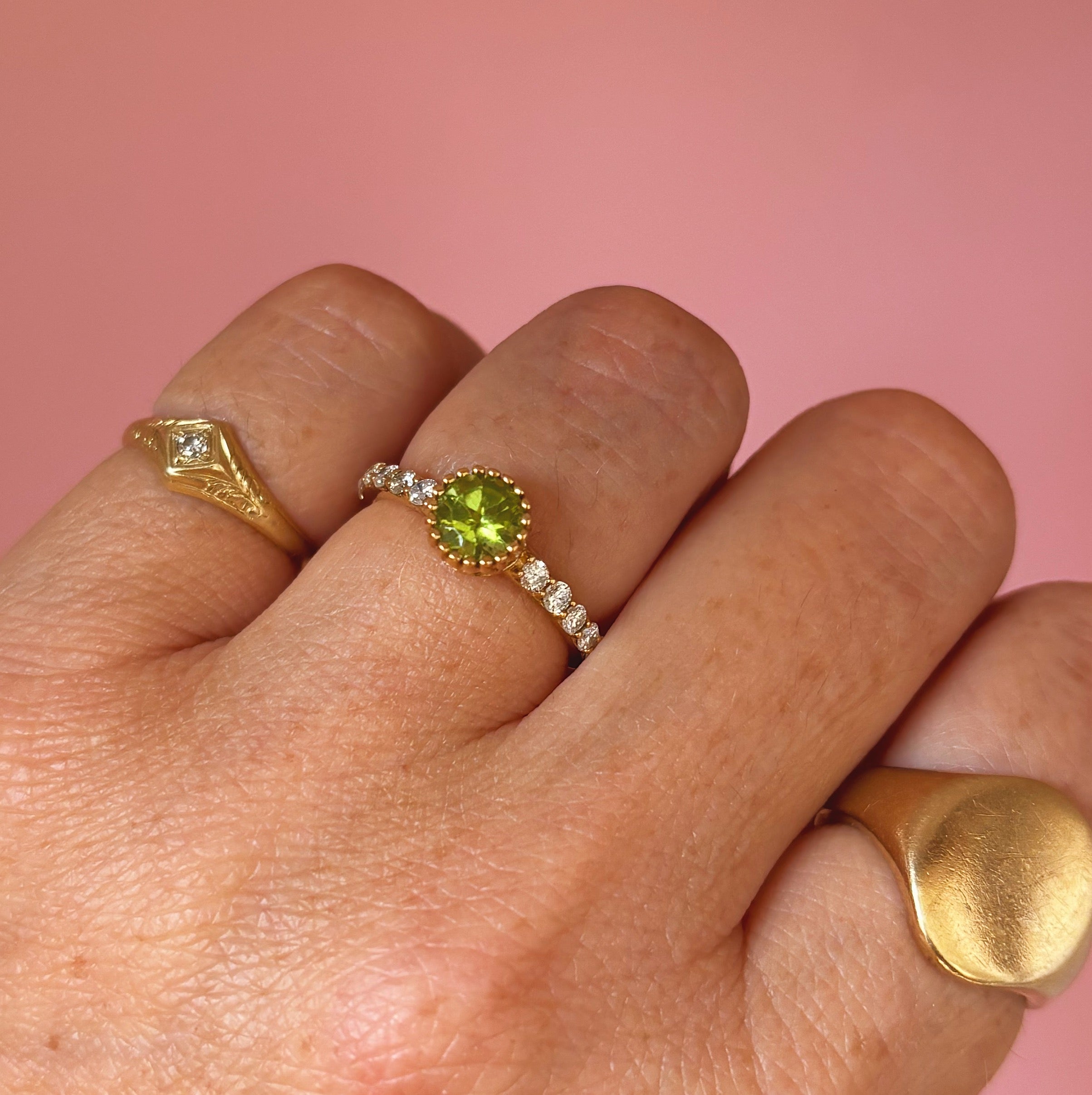 18ct gold peridot and diamond half eternity ring