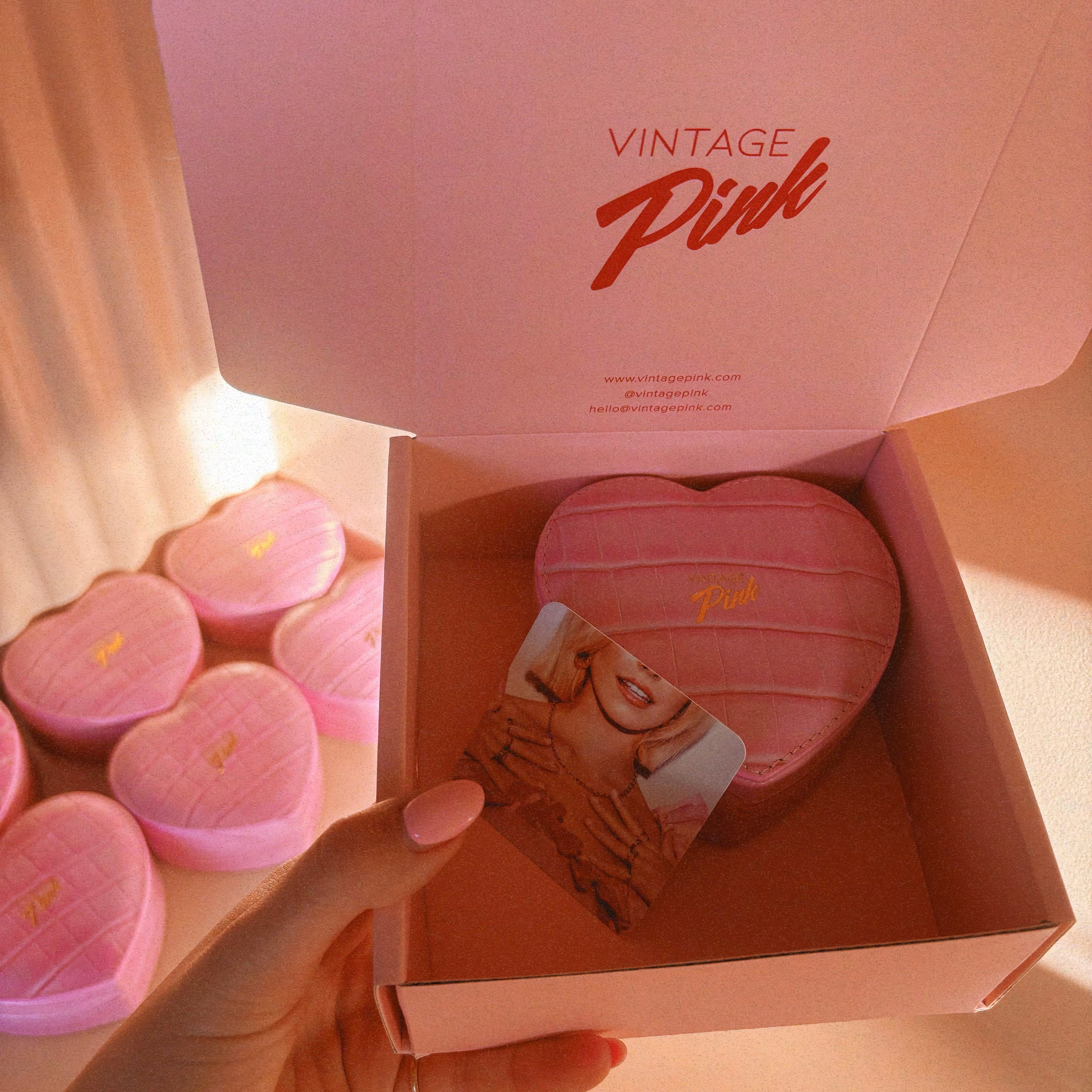 Heart-shaped pink faux croc and red velvet jewellery box