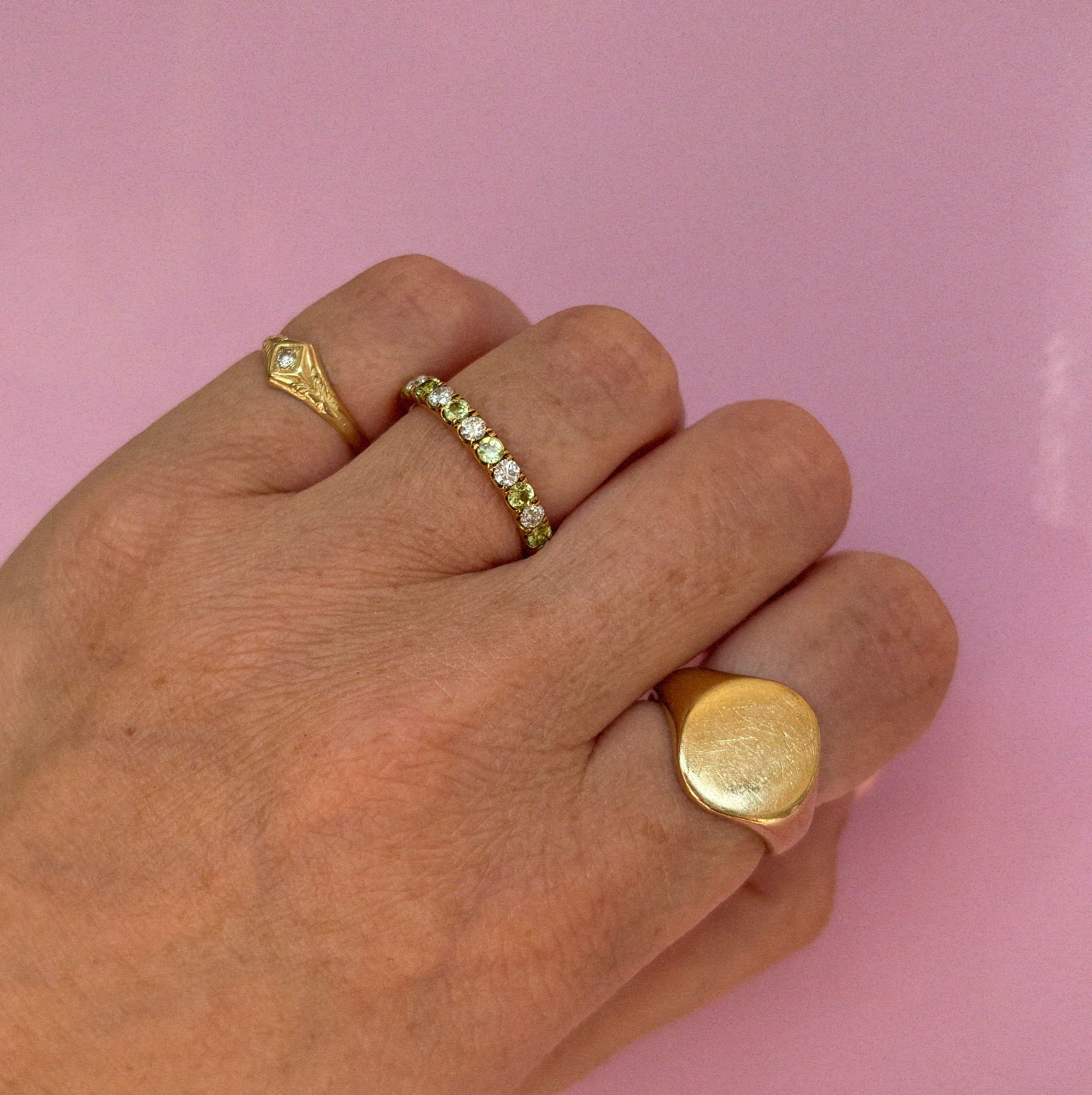 9ct gold 0.43ct peridot and 0.30ct diamond half-eternity ring