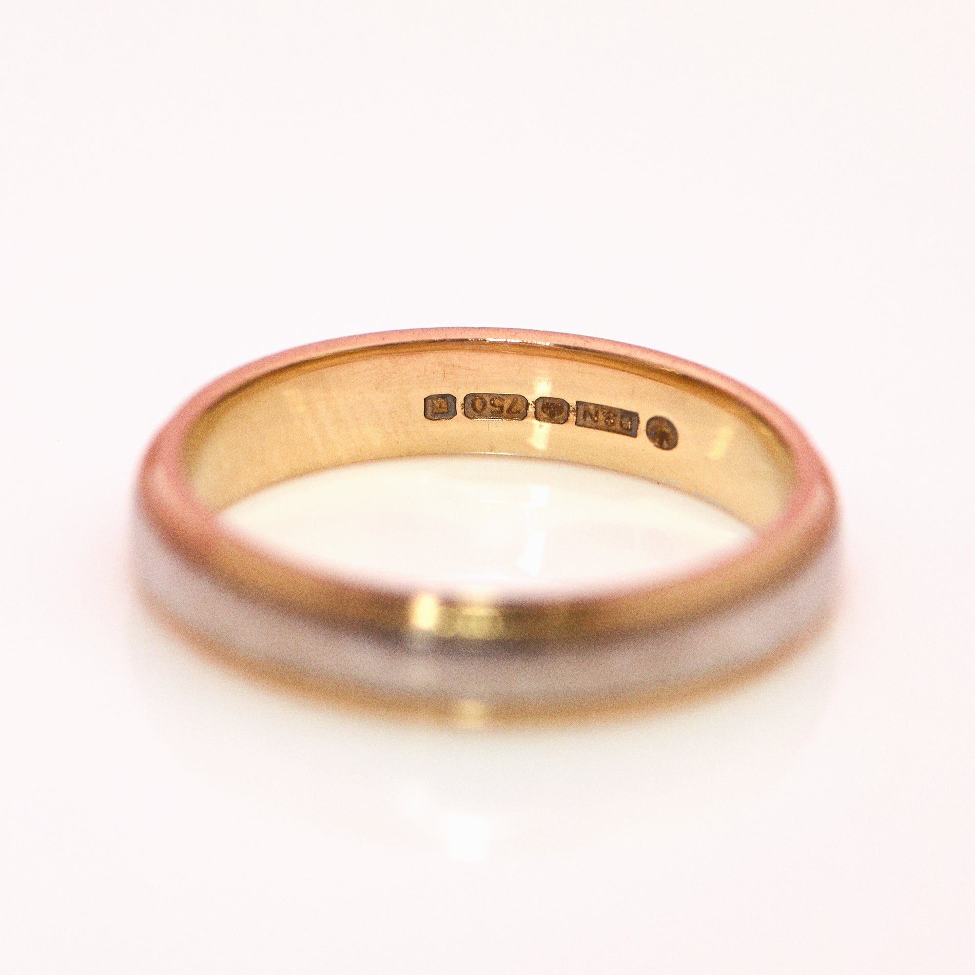 18ct gold two tone band with a beaded edge
