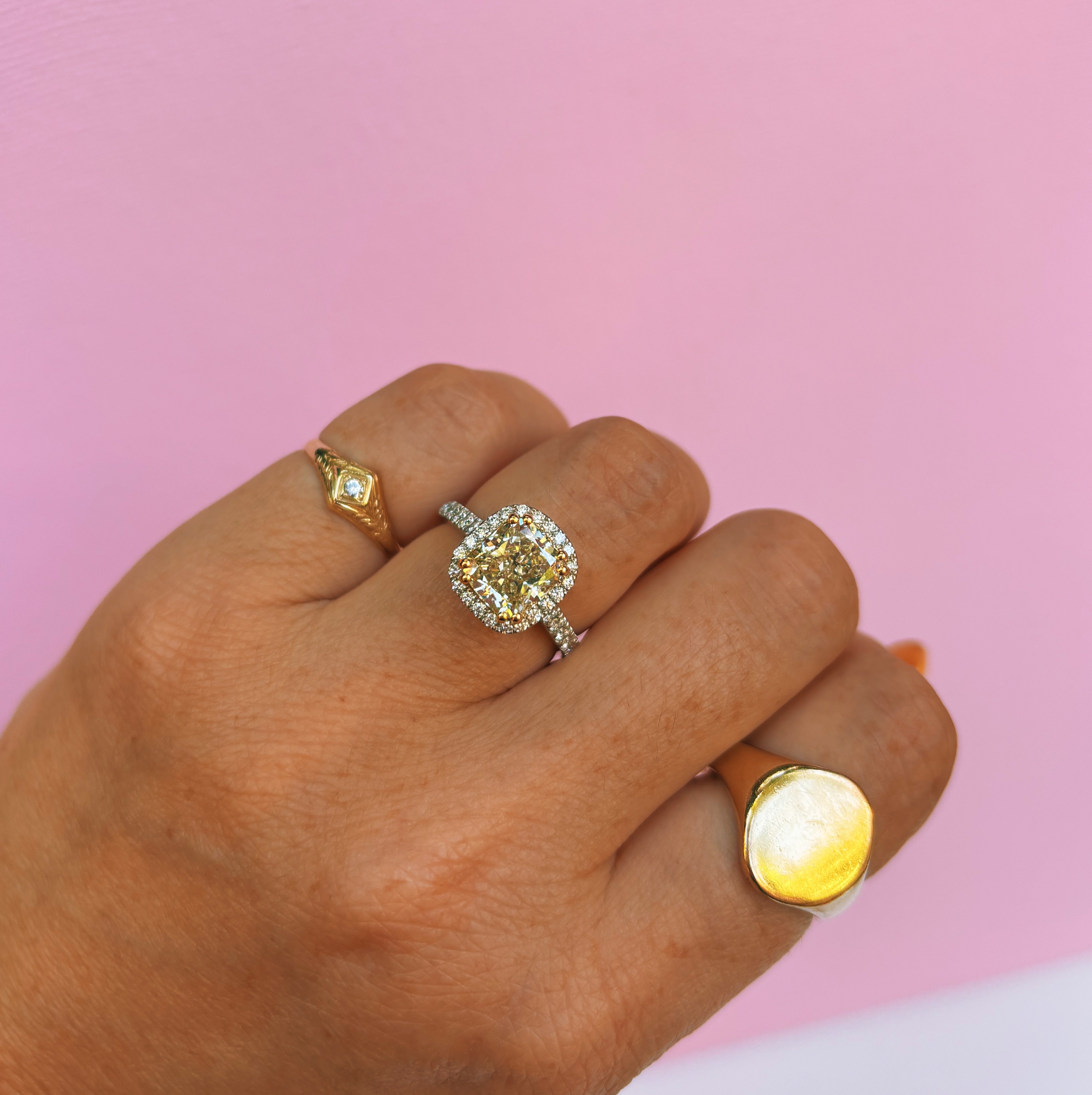 Platinum 3.0ct cushion cut yellow diamond halo ring