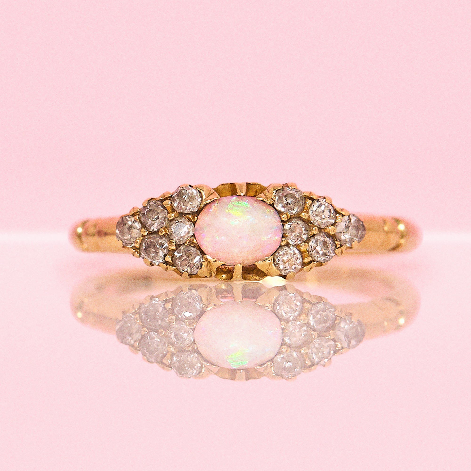 18ct gold opal and old cut diamond east to west Victorian ring