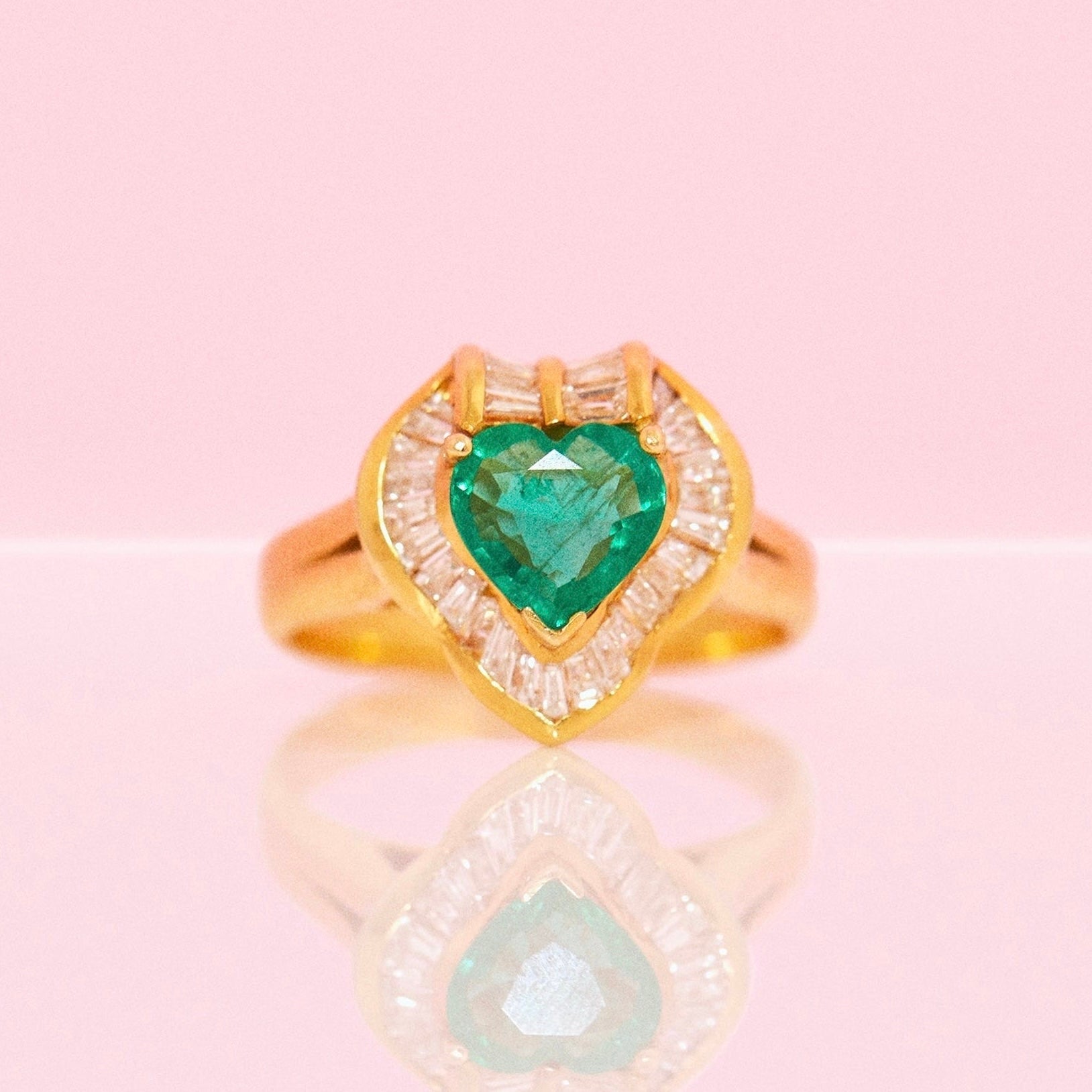 18ct gold heart shaped emerald and baguette diamond ring