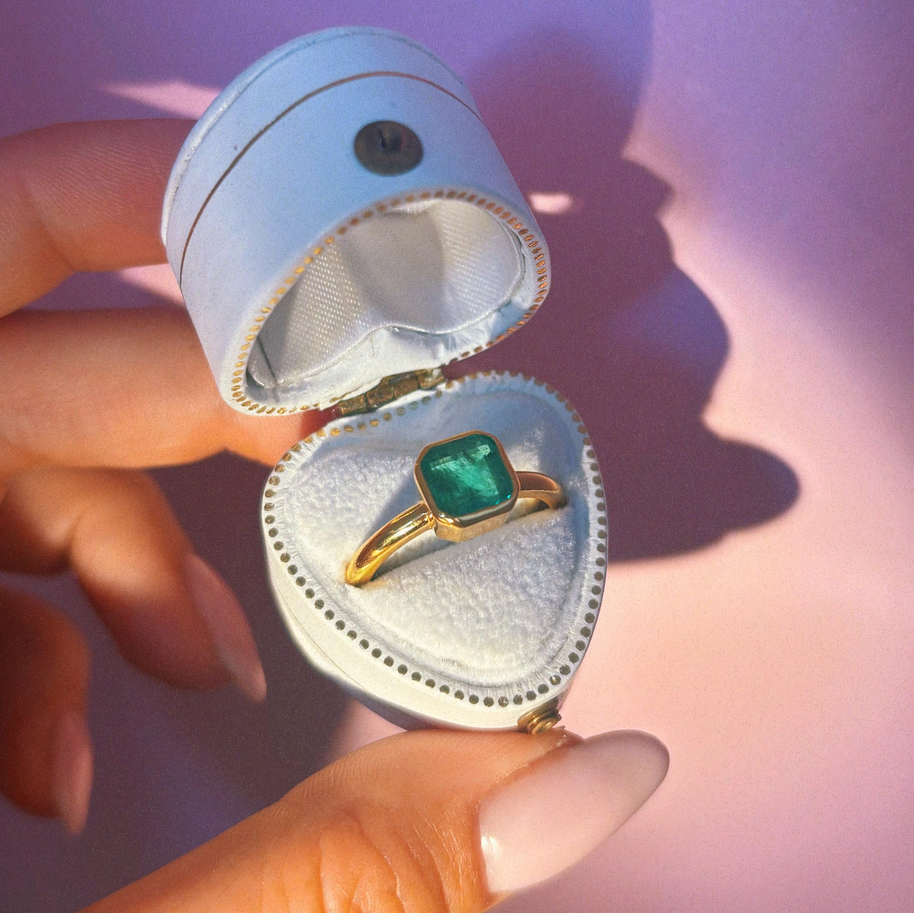 14ct gold bezel-set, asscher cut emerald ring