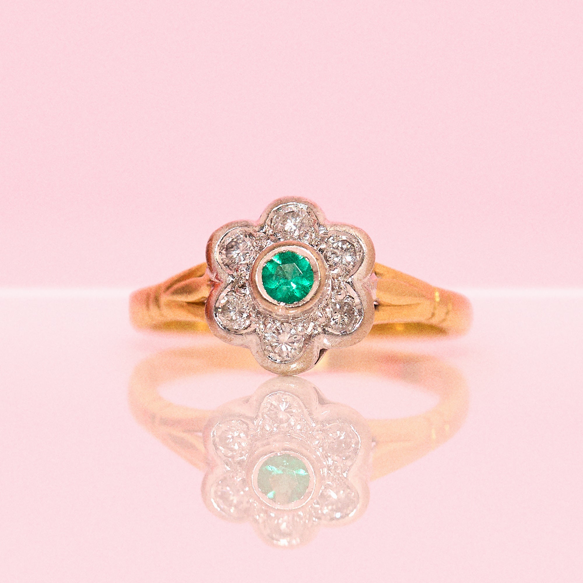 18ct gold emerald and diamond flower ring
