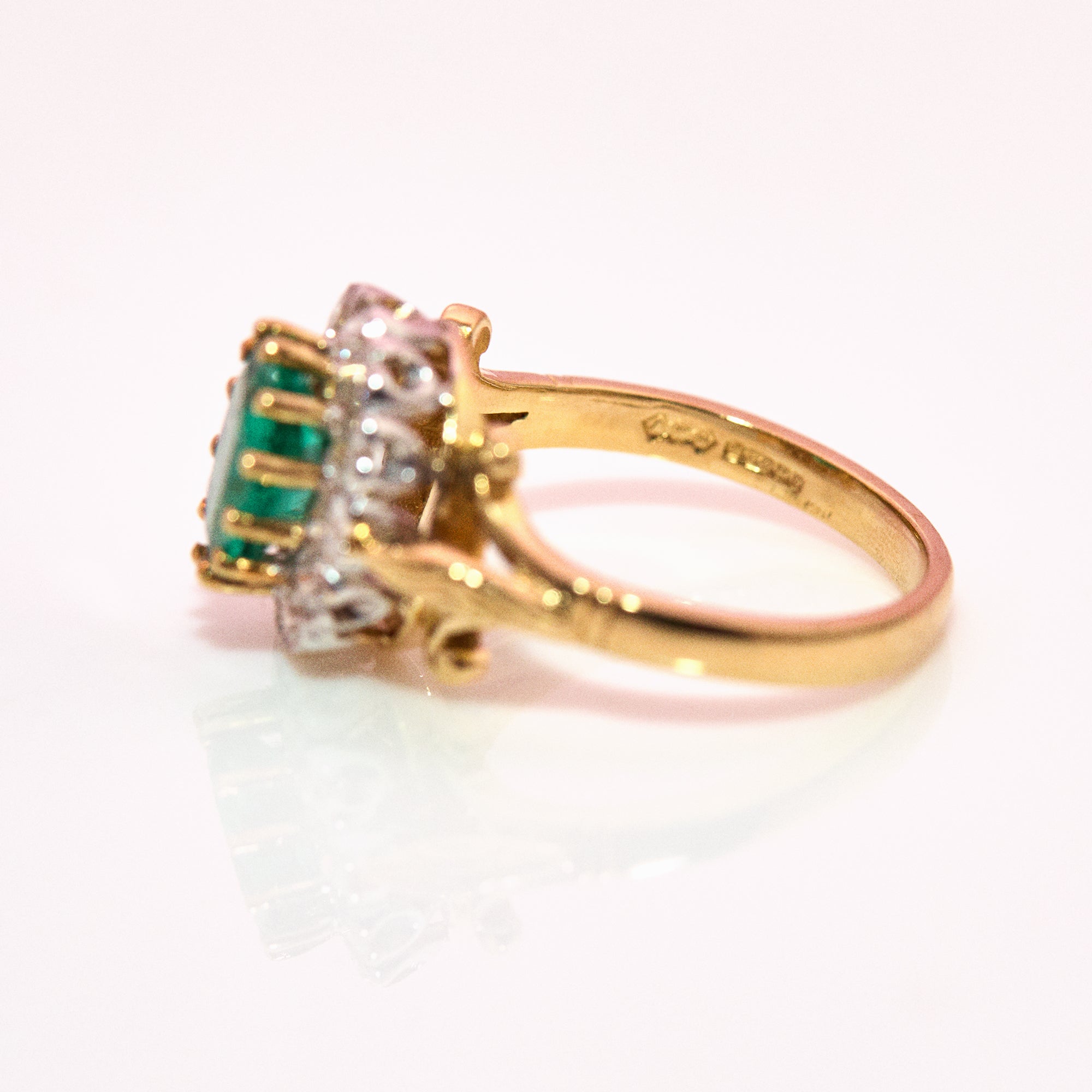 18ct gold 1.46ct emerald and diamond cluster ring
