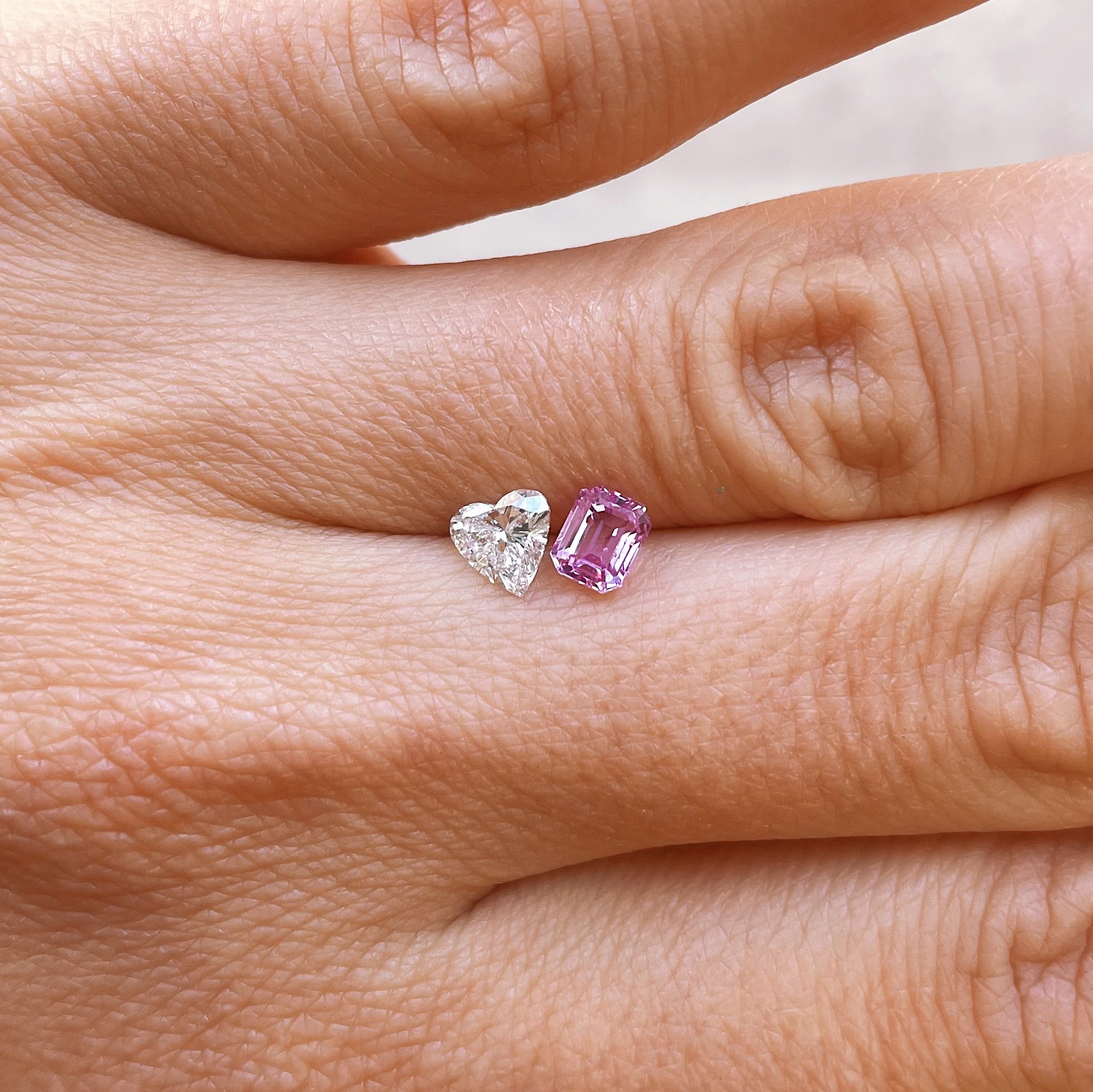 18ct gold ‘toi et moi’ 0.46ct heart-shaped diamond and 0.60ct pink sapphire ring (made to order)