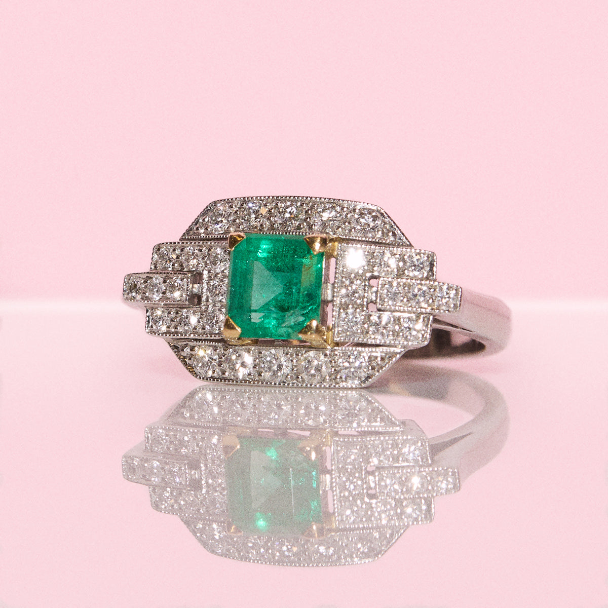 Vintage Platinum gold 0.75ct emerald and 0.50ct diamond ring