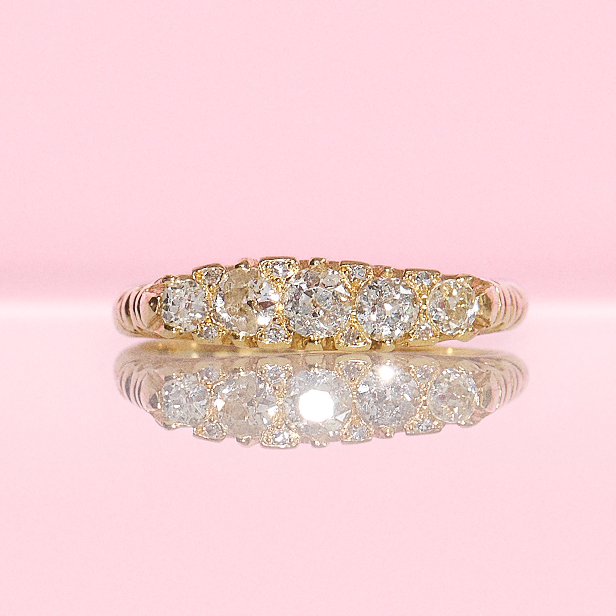18ct gold old cut diamond five stone carved ring
