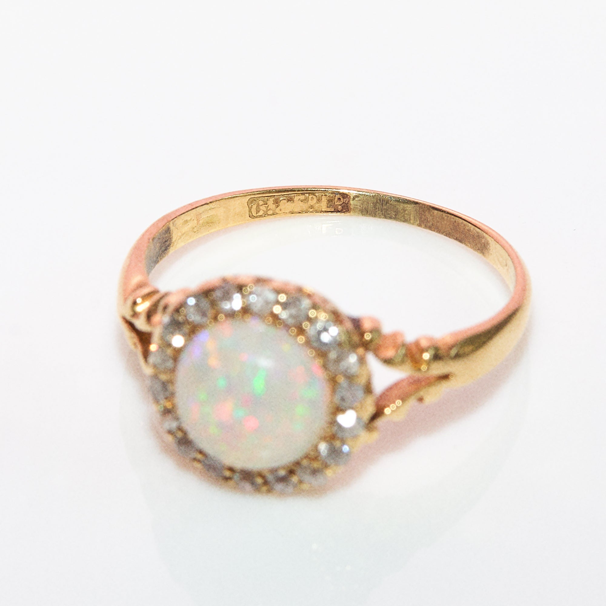 18ct gold round opal and diamond cluster ring