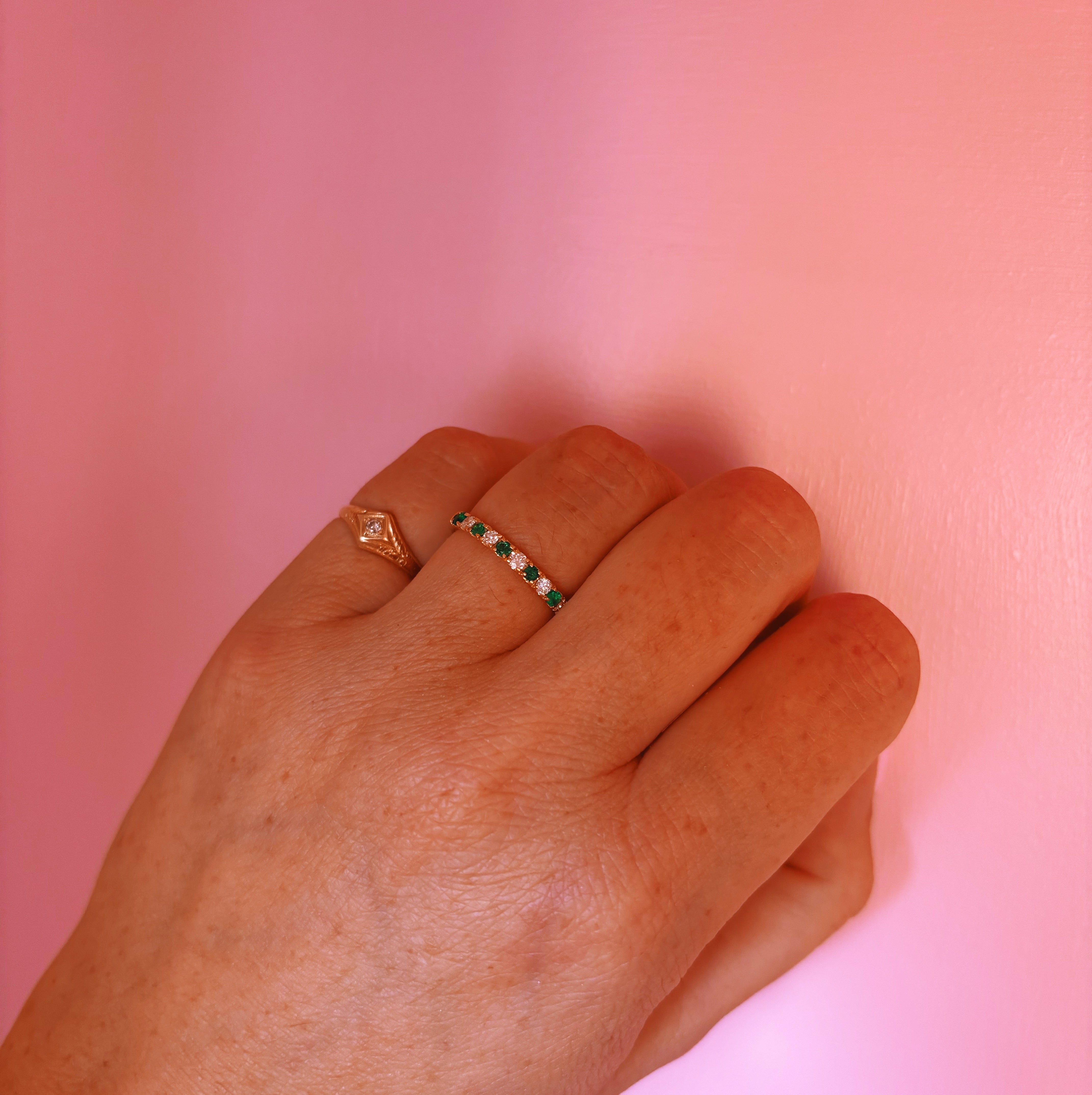 18ct yellow gold emerald and diamond half eternity ring