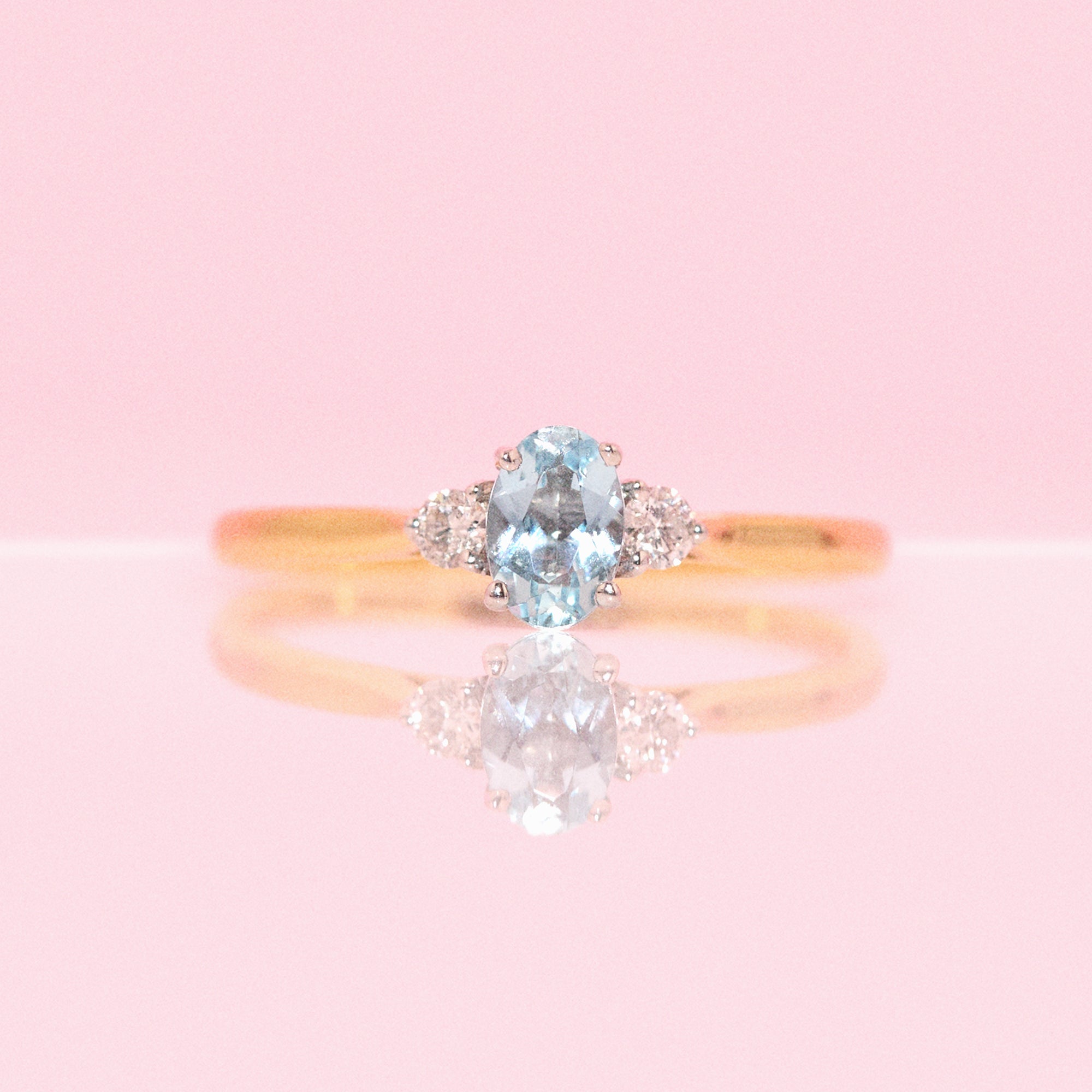 18ct gold 0.21ct oval aquamarine and diamond three stone ring (made to order)