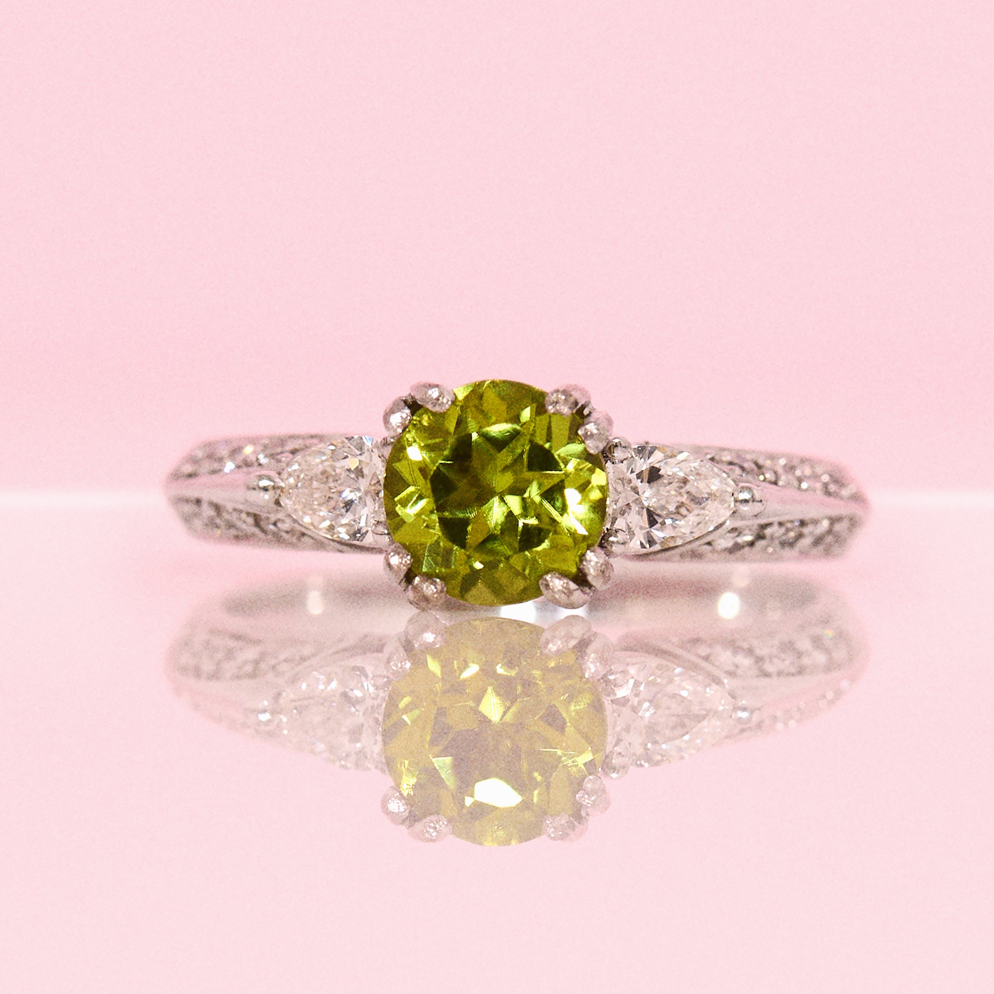 18ct white gold peridot and pear diamond ring