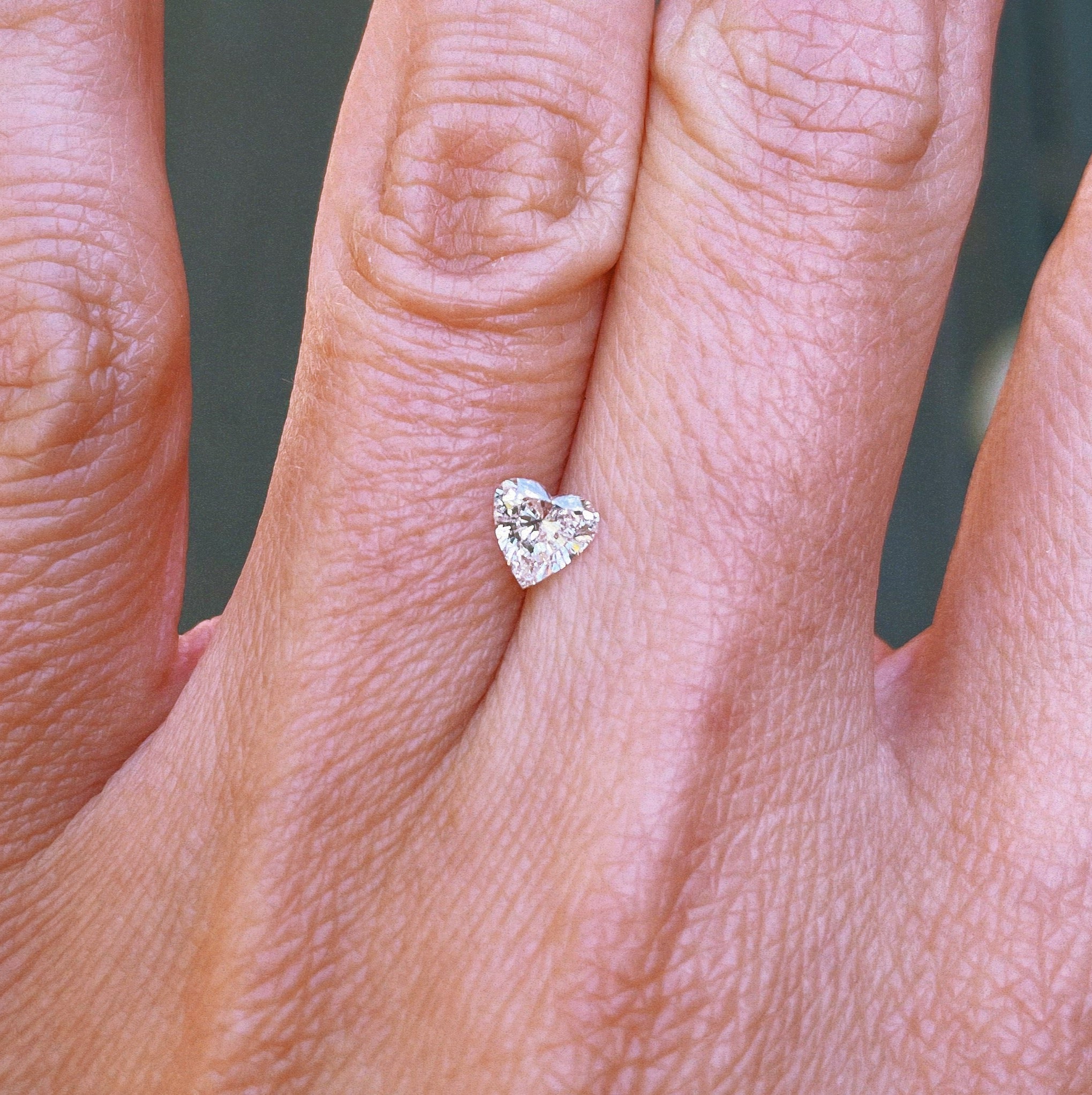 18ct gold ‘toi et moi’ 0.46ct heart-shaped diamond and 0.60ct pink sapphire ring (made to order)