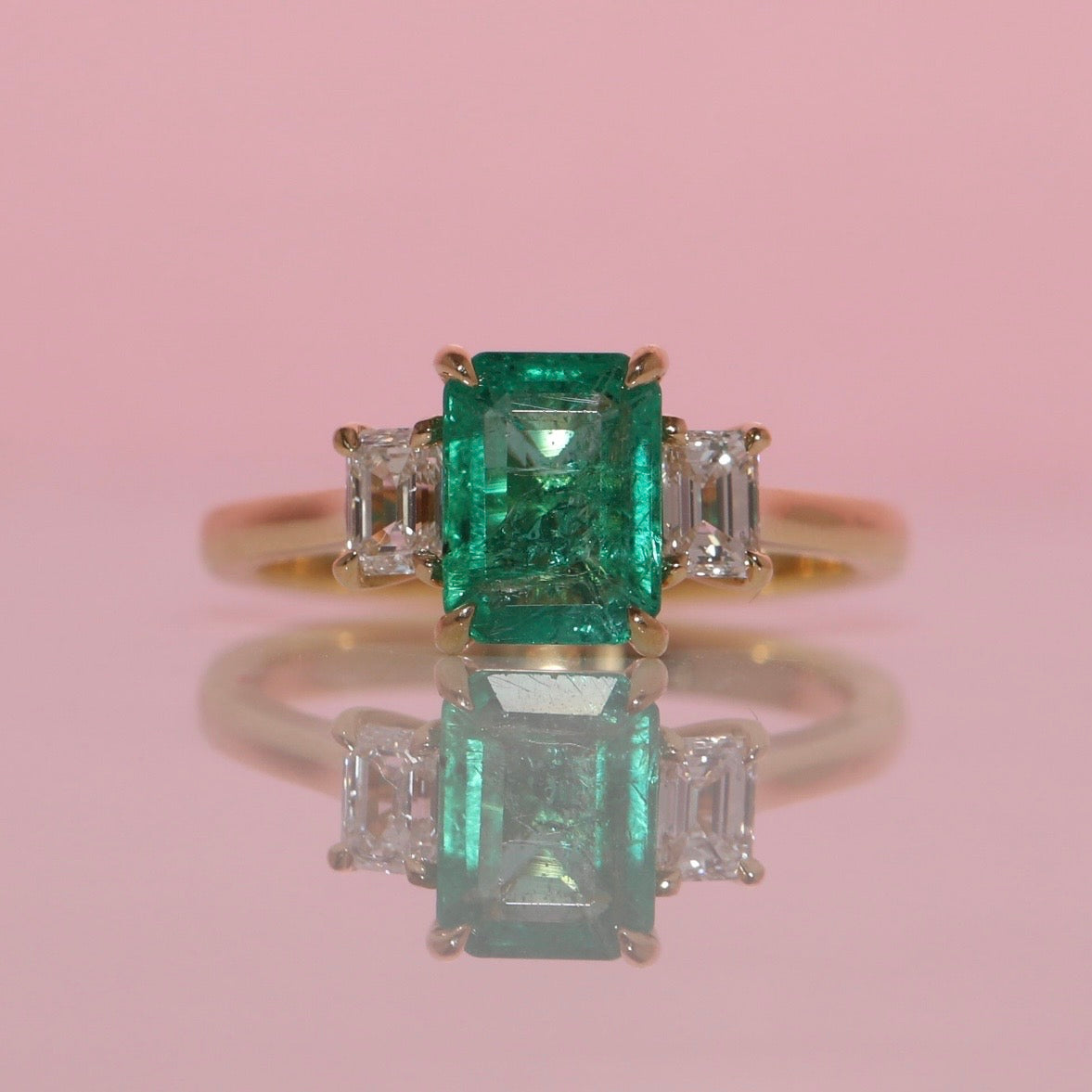 18ct gold 1.34ct emerald cut emerald and diamond three stone ring (made to order)