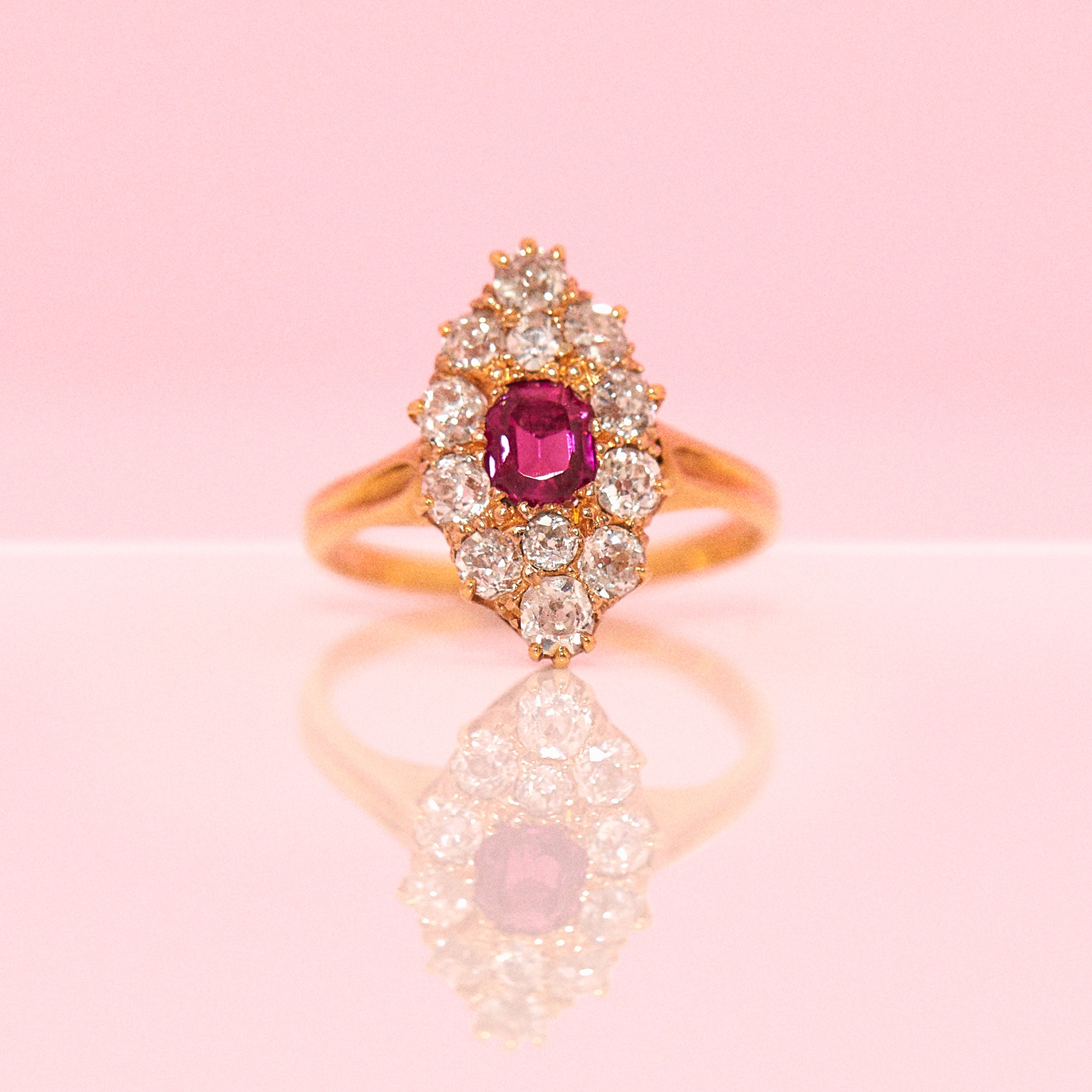 18ct gold ring set with a ruby and a diamonds