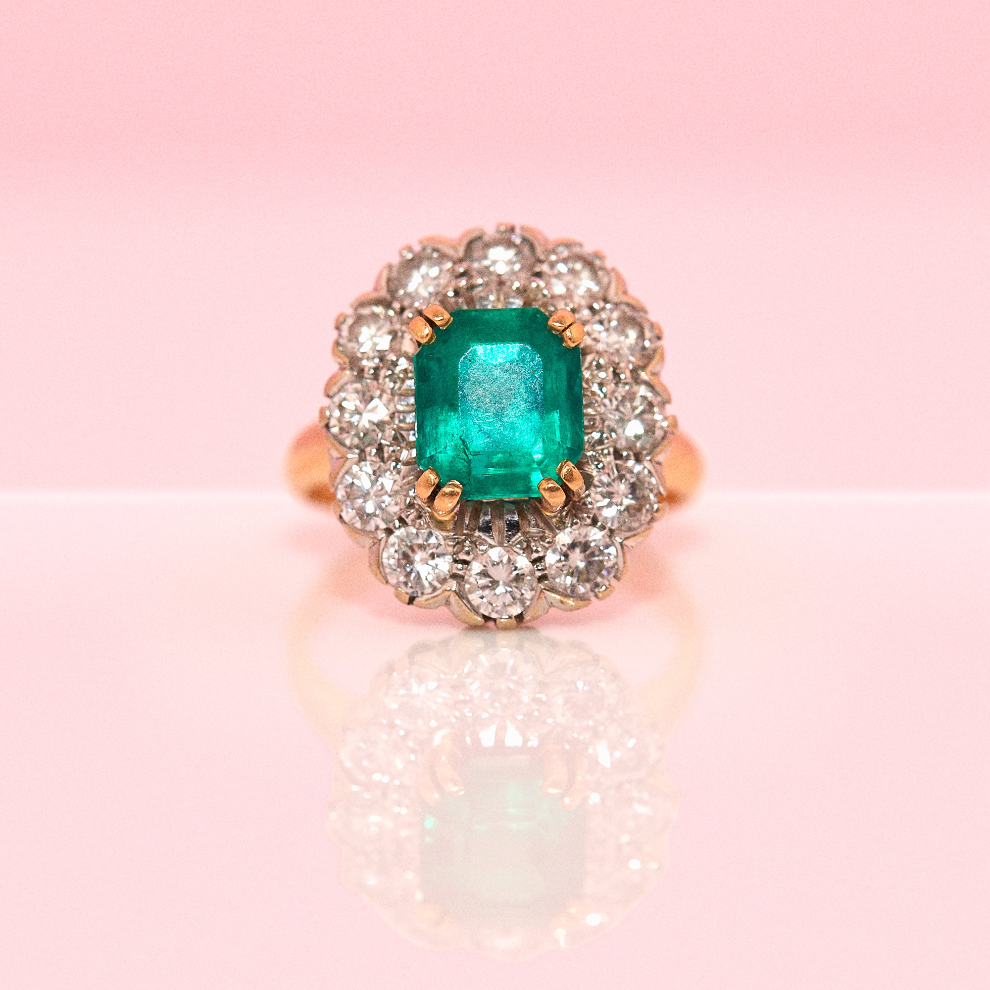 18ct gold emerald and diamond cluster ring