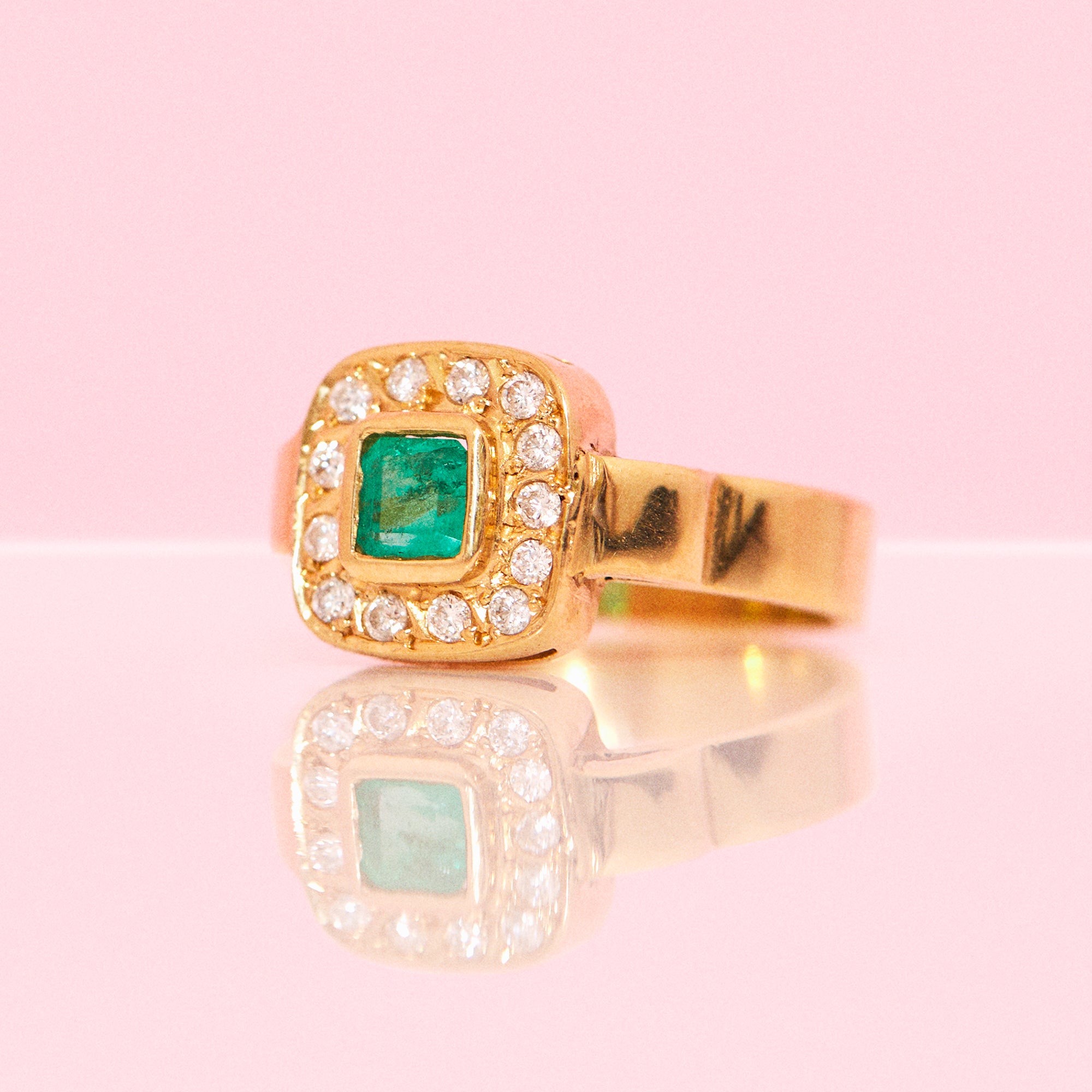 18ct gold emerald and diamond ring
