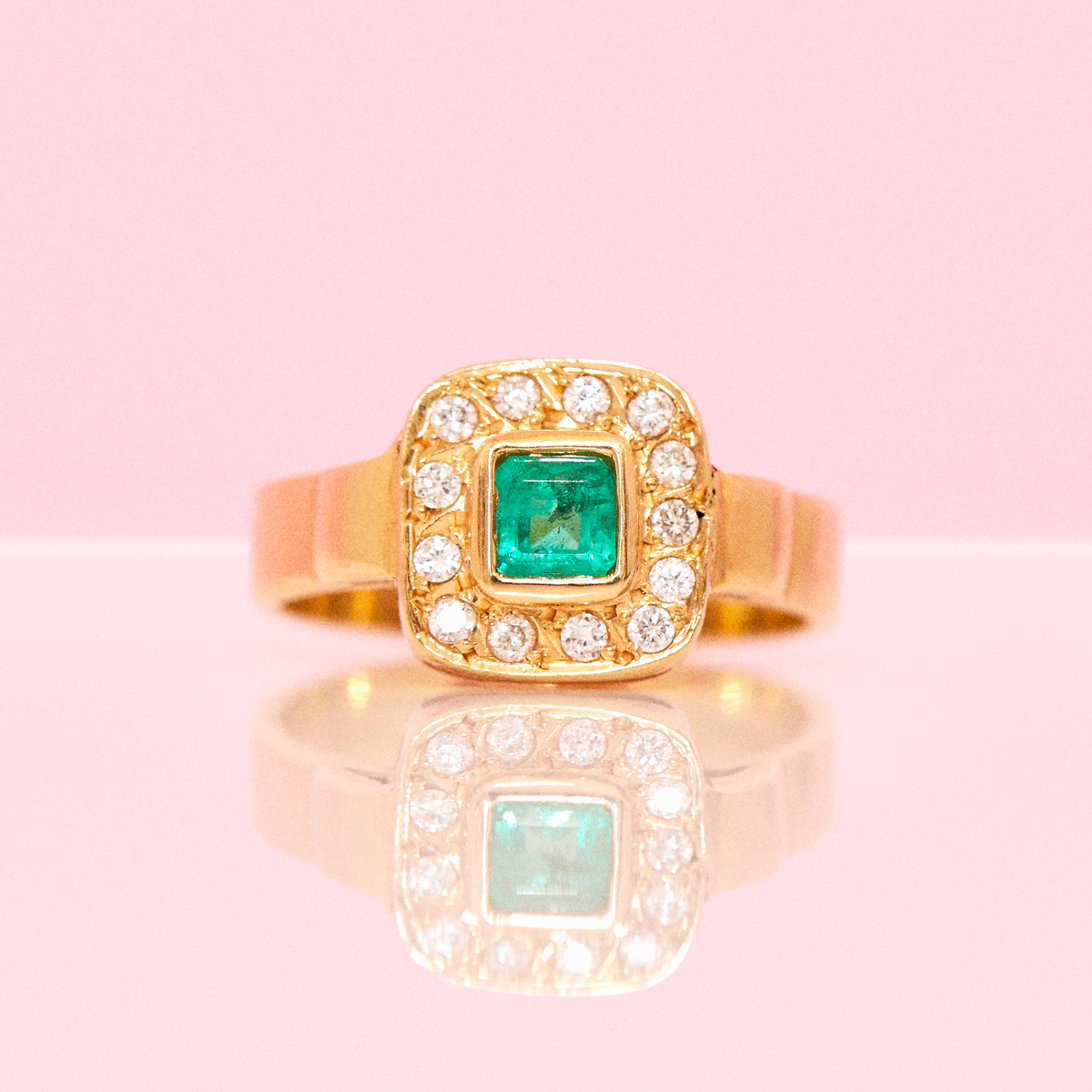 18ct gold emerald and diamond ring