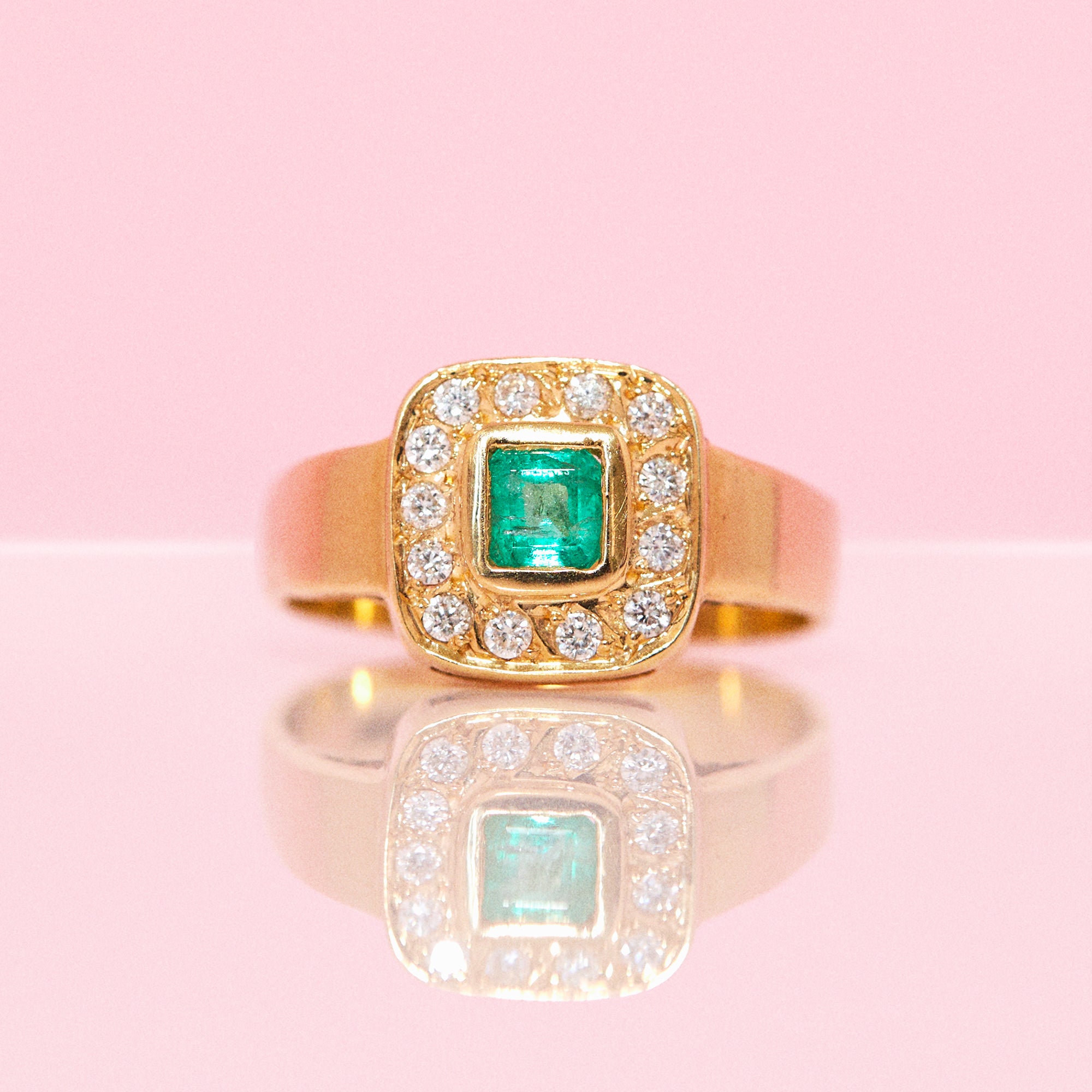 18ct gold emerald and diamond ring