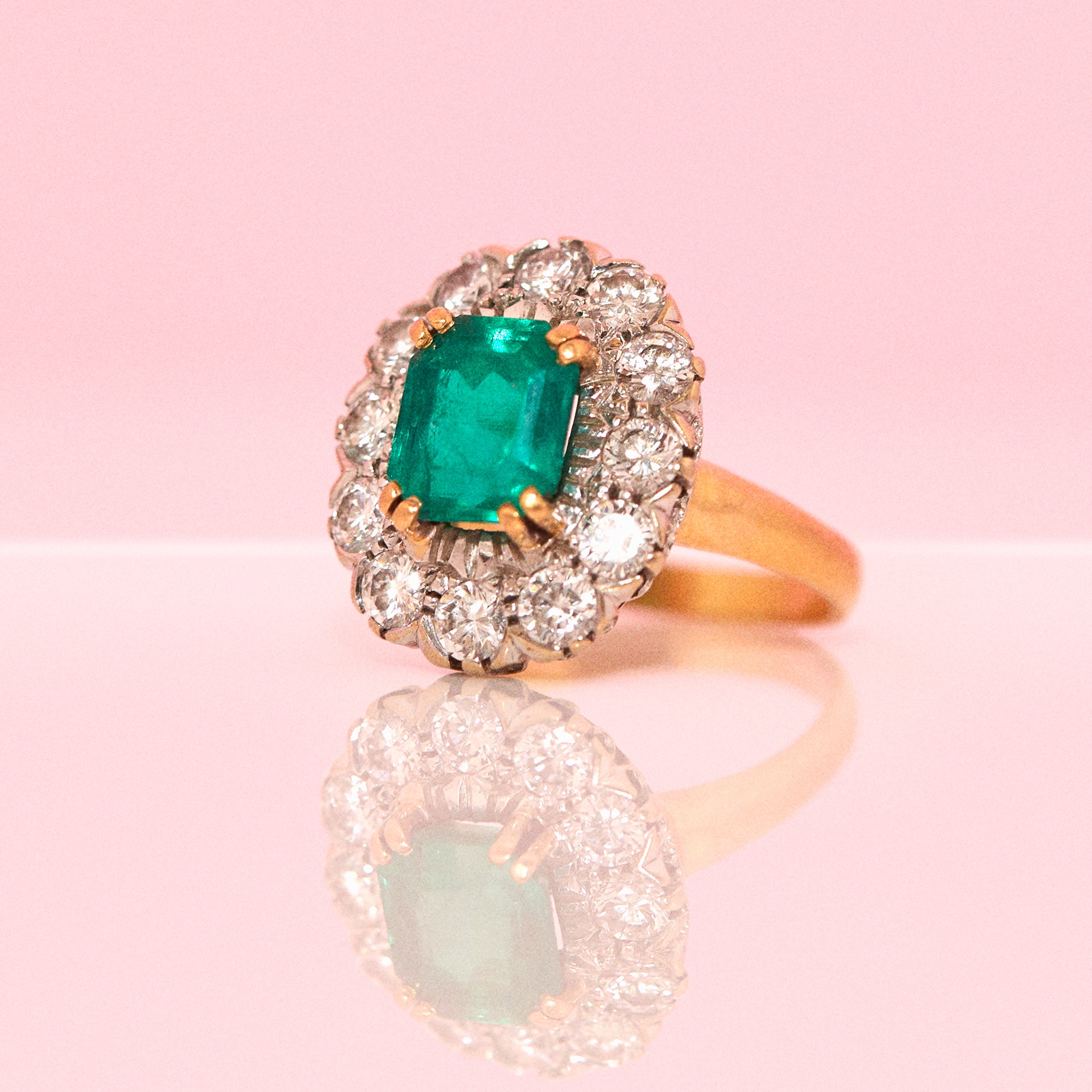 18ct gold emerald and diamond cluster ring