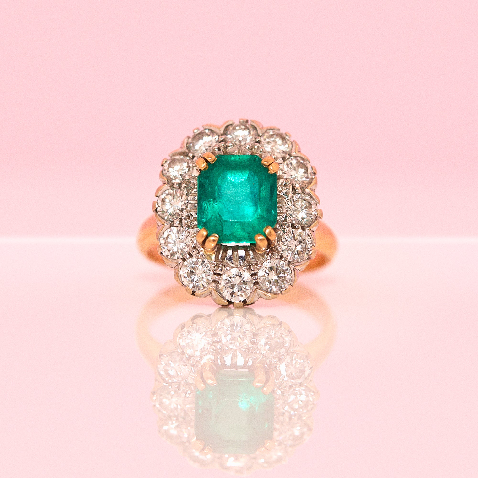 18ct gold emerald and diamond cluster ring