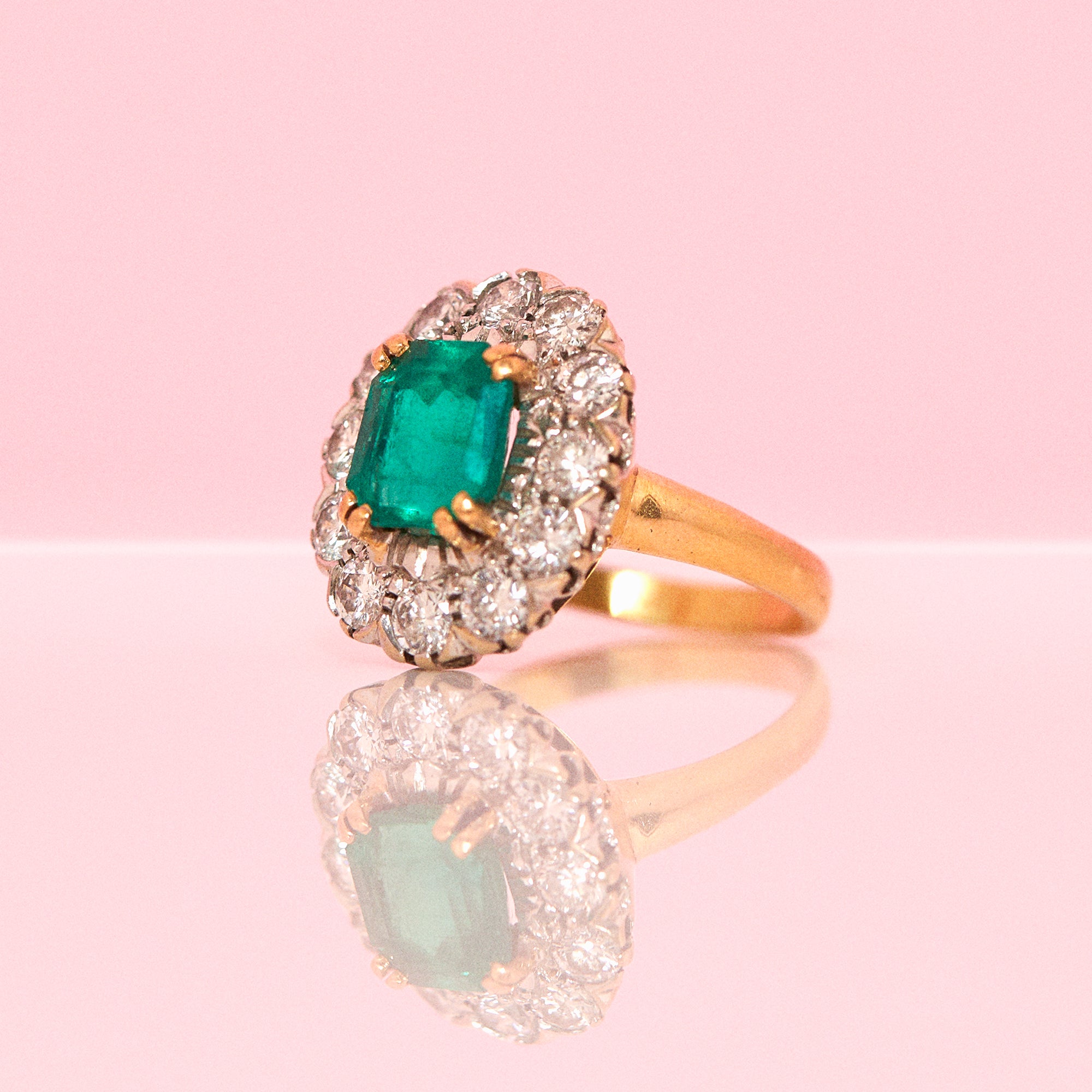 18ct gold emerald and diamond cluster ring