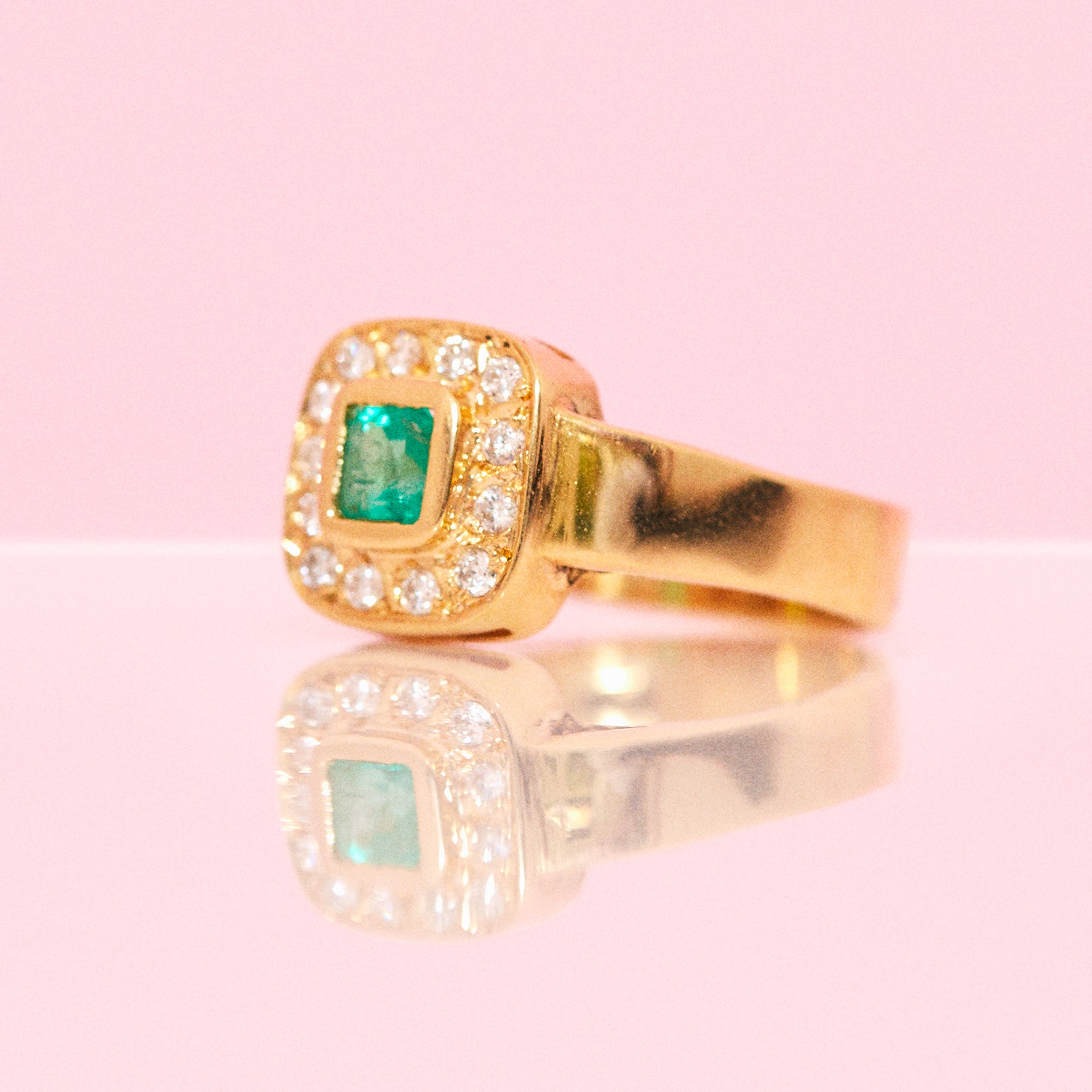 18ct gold emerald and diamond ring