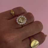 18ct gold 1.0ct oval, yellow diamond flower ring