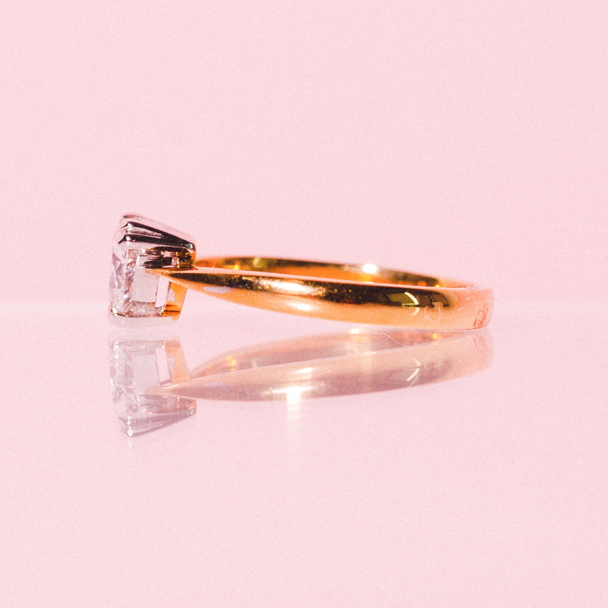 18ct gold ring set with a heart shaped diamond