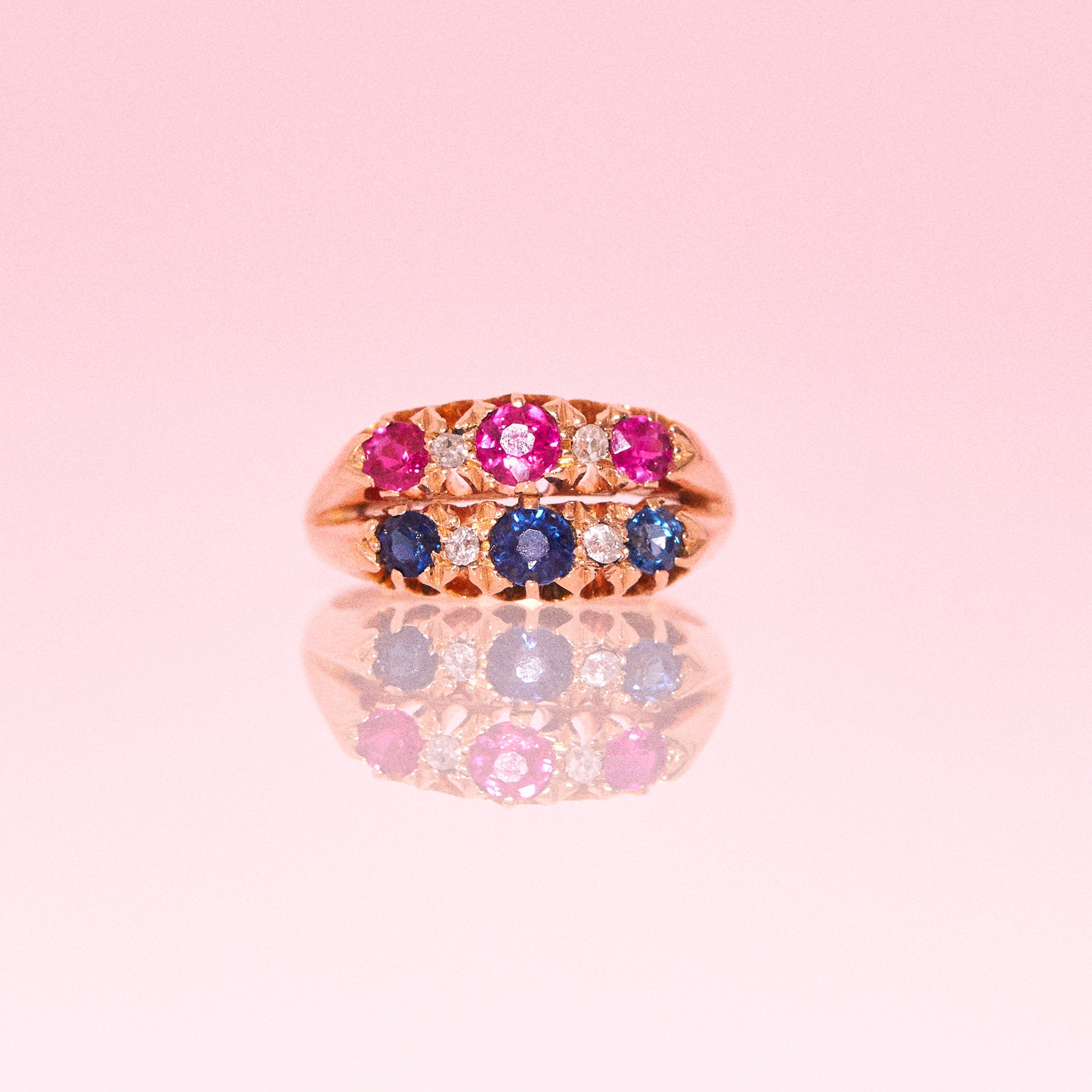 18ct gold ring set with sapphires, rubies and diamonds