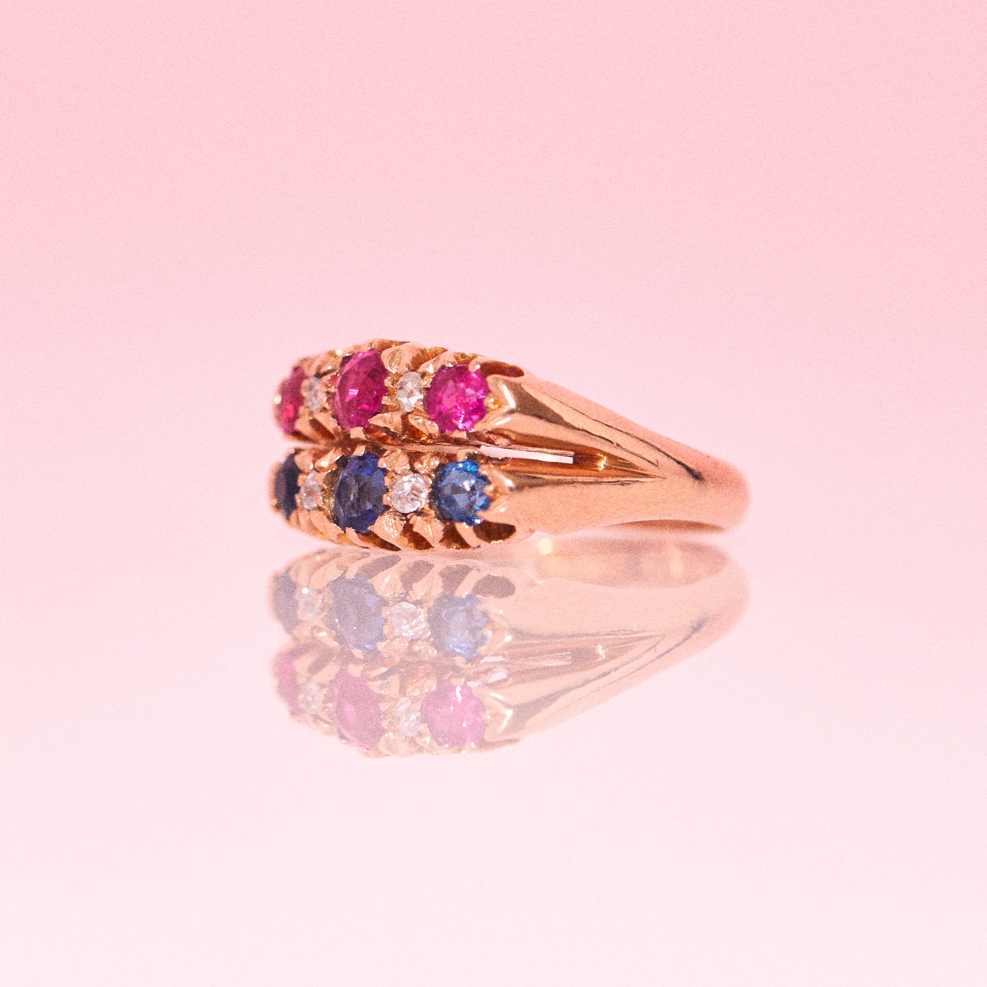 18ct gold ring set with sapphires, rubies and diamonds