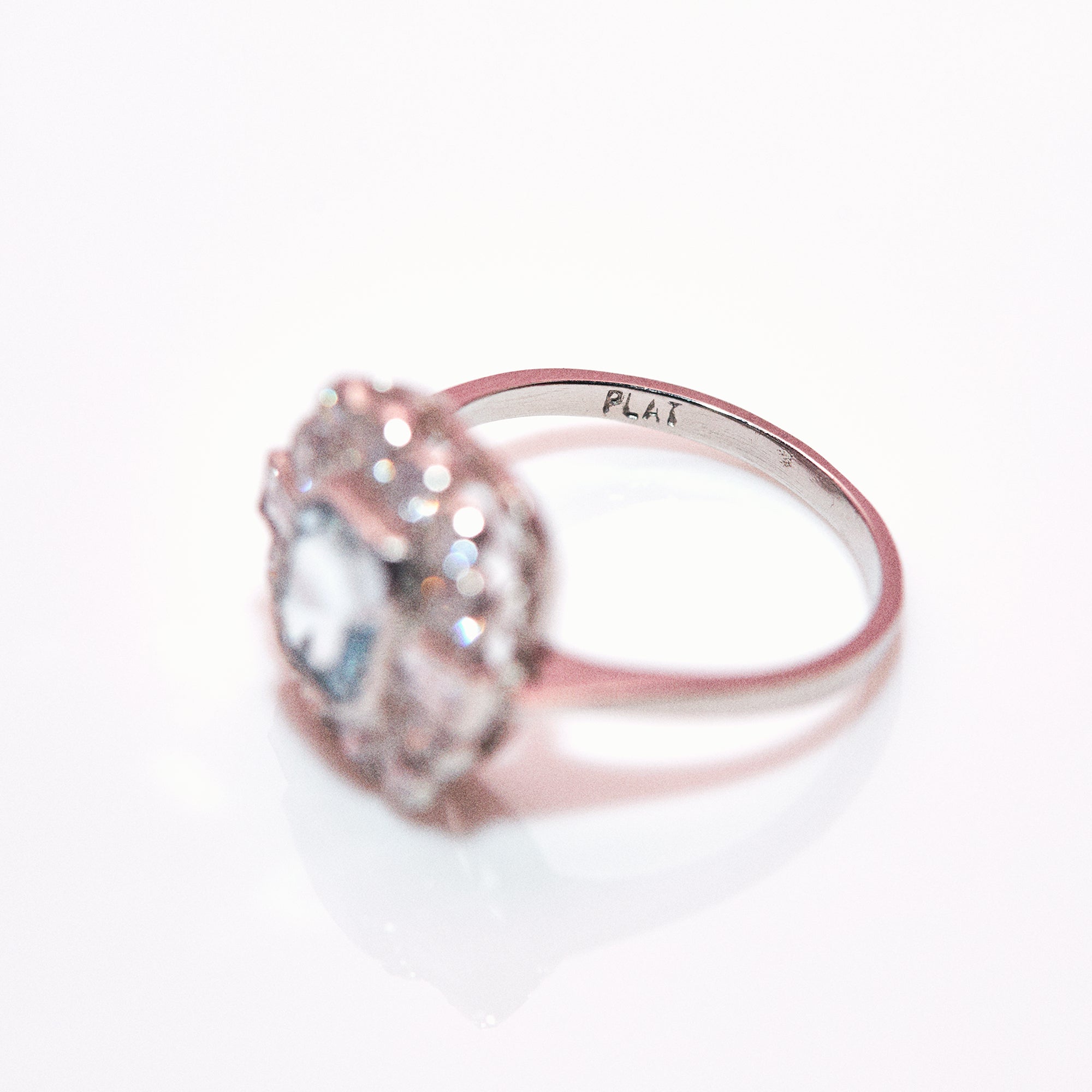 Platinum ring set with an aquamarine and diamonds