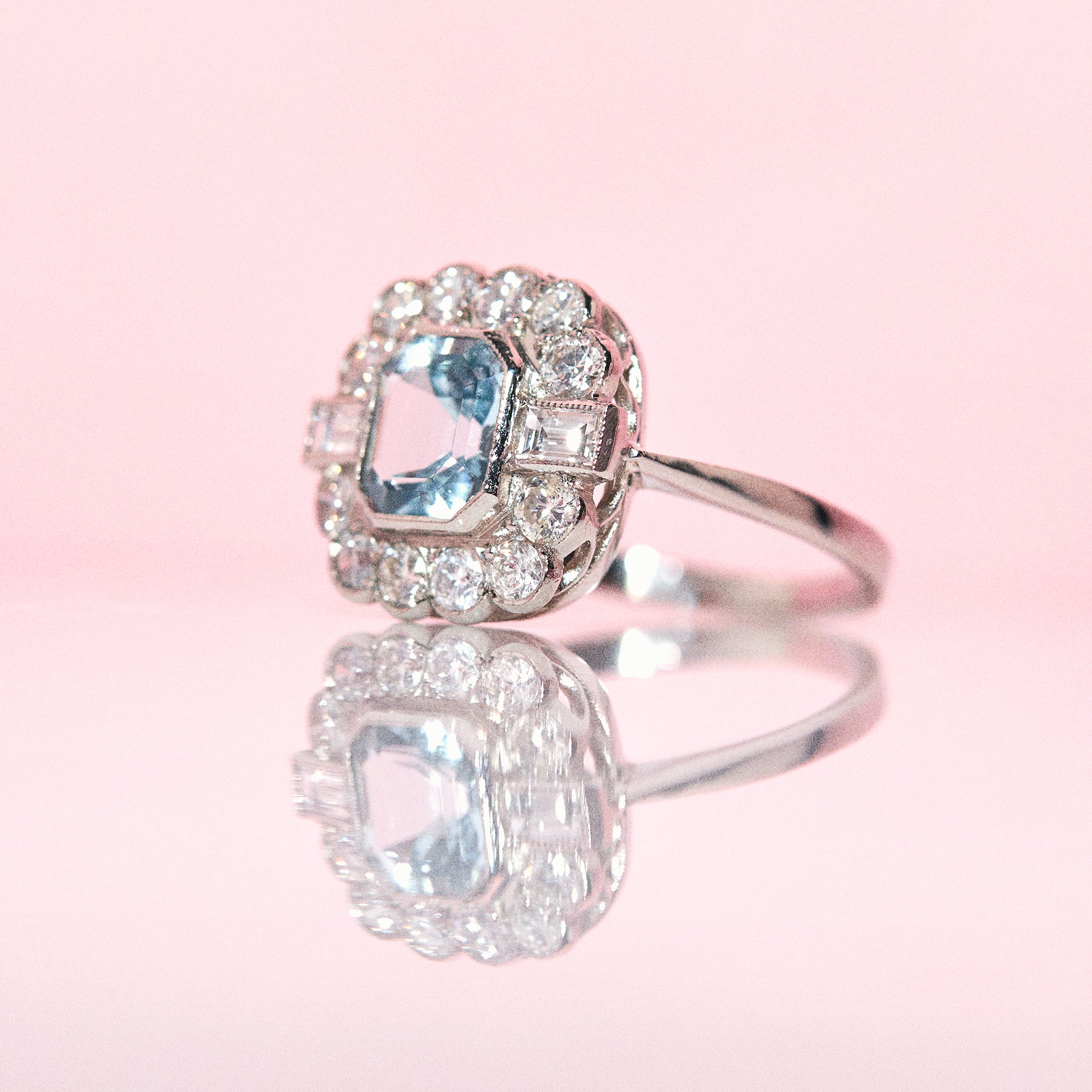 Platinum ring set with an aquamarine and diamonds