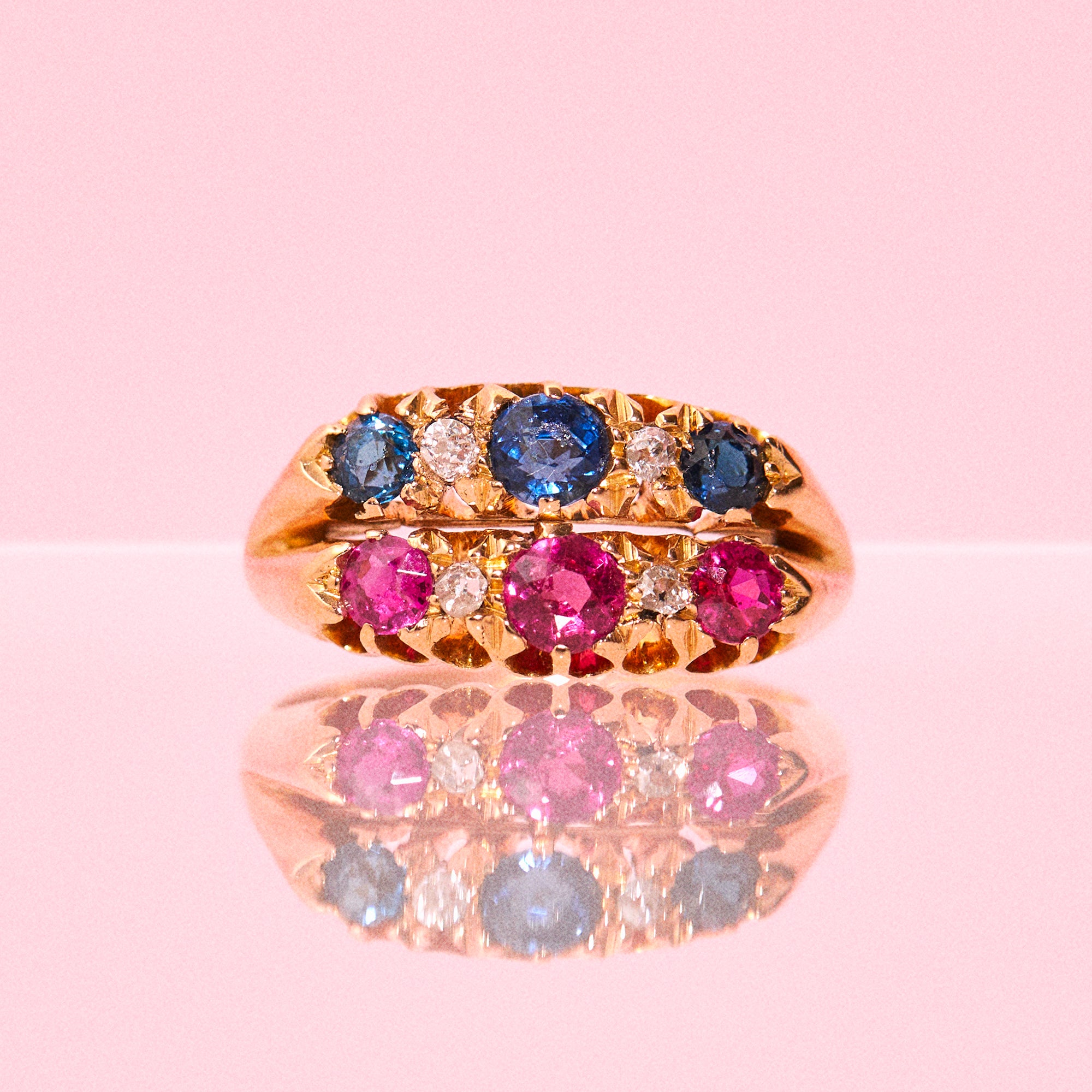 18ct gold ring set with sapphires, rubies and diamonds