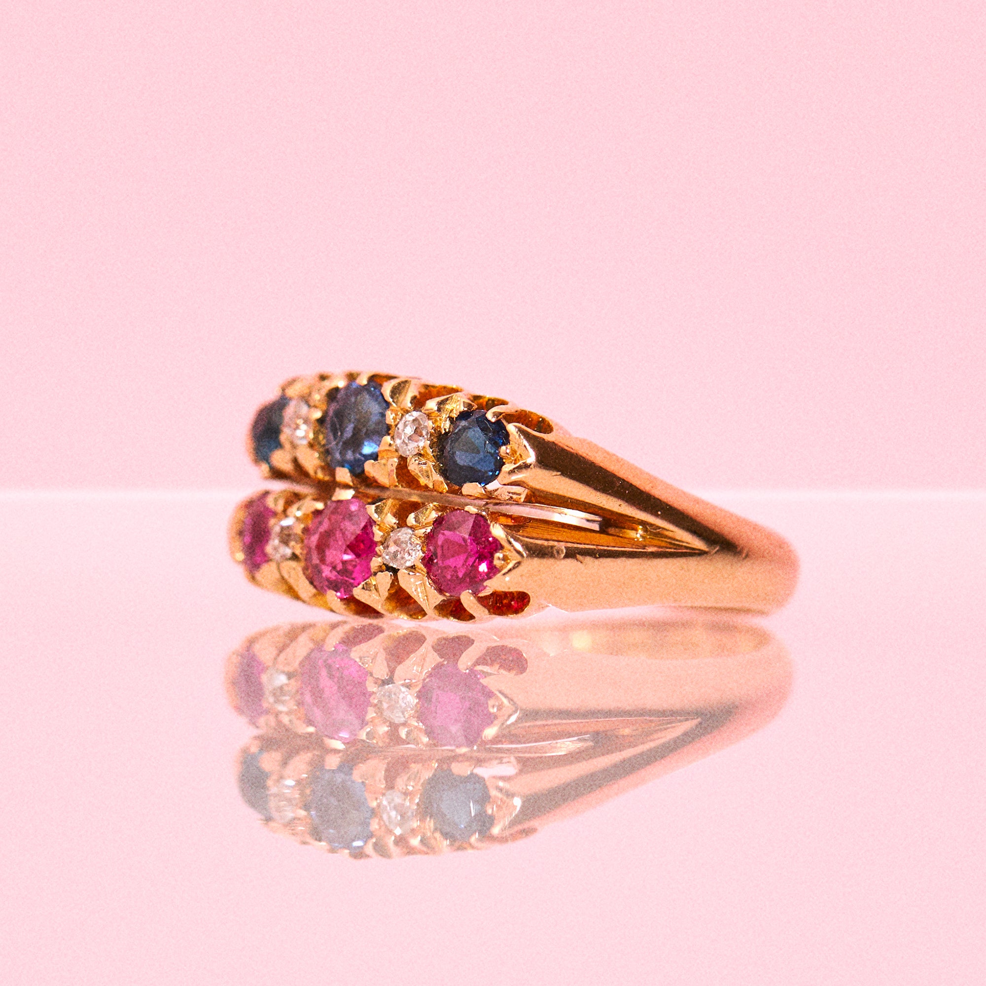 18ct gold ring set with sapphires, rubies and diamonds
