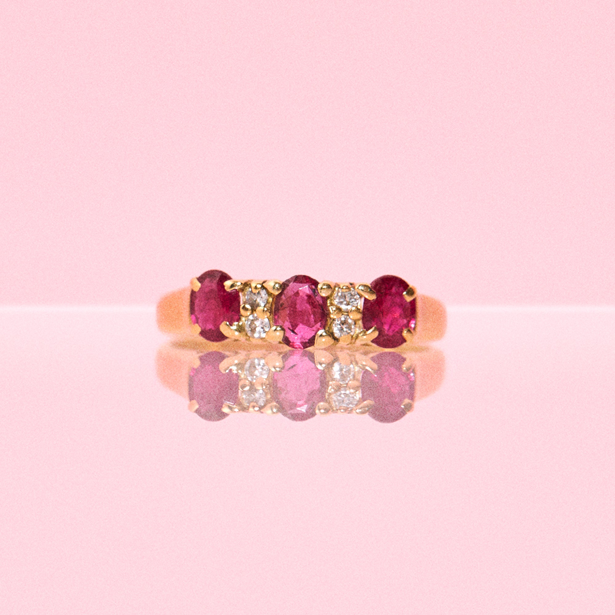 18ct gold ring set with a ruby and diamonds