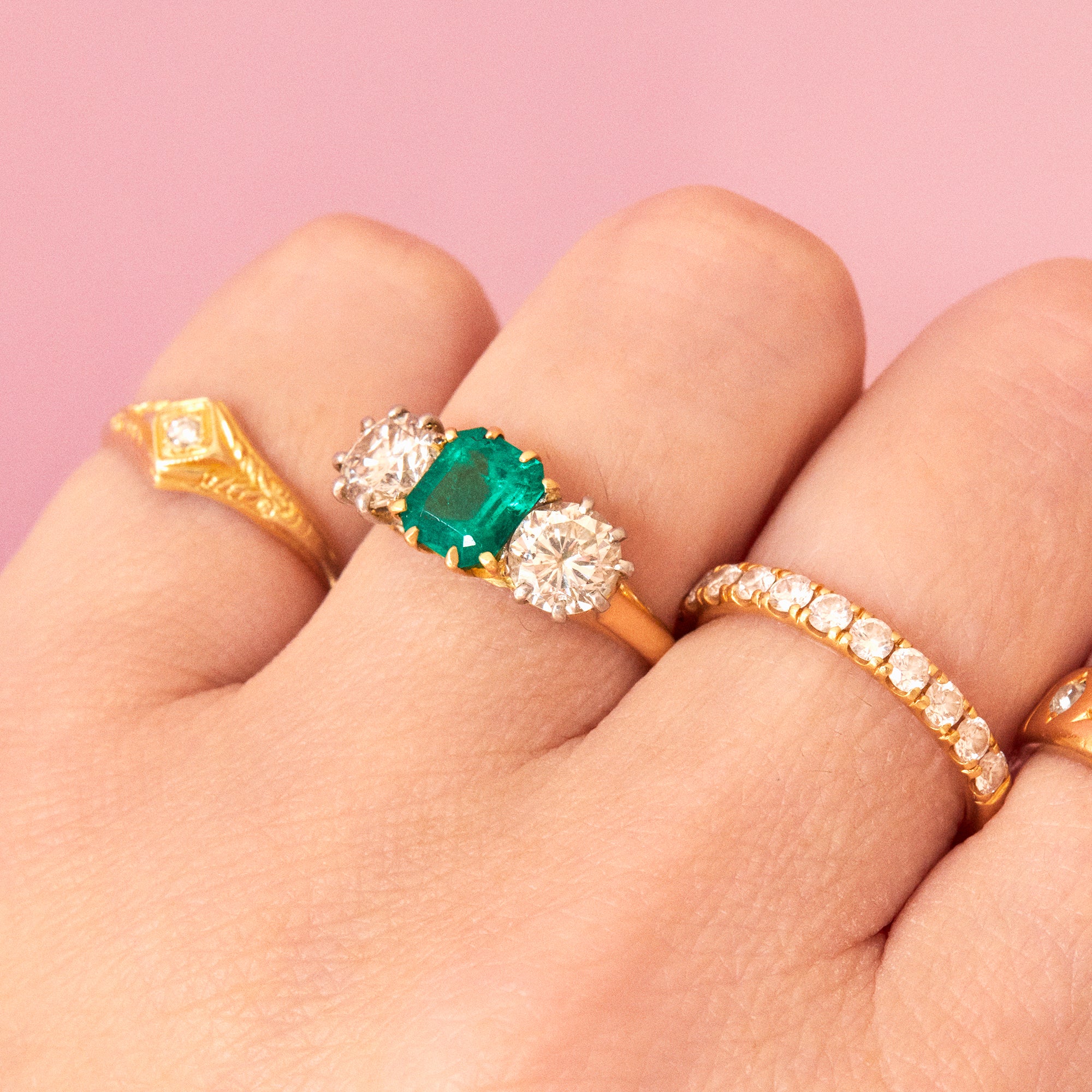 18ct gold ring set with an emerald and diamonds