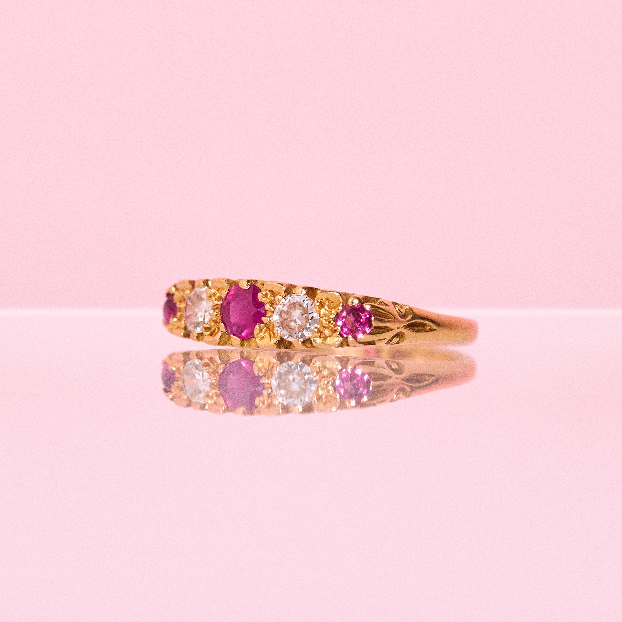 18ct gold ring set with rubies and diamonds