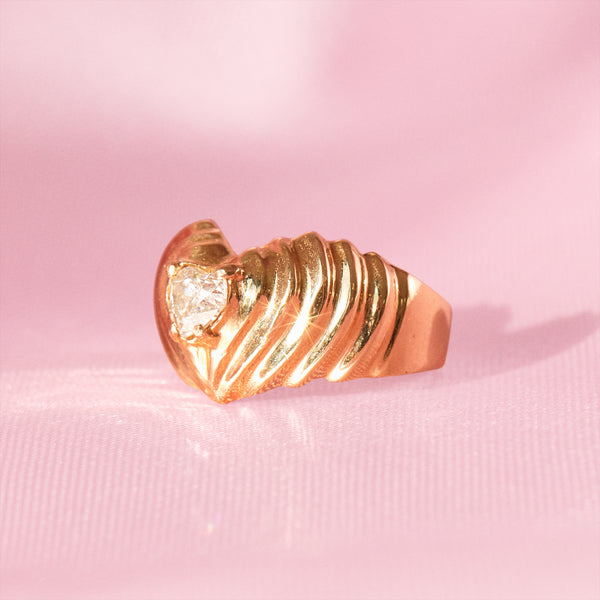 14ct gold ring set with a heart shaped diamond