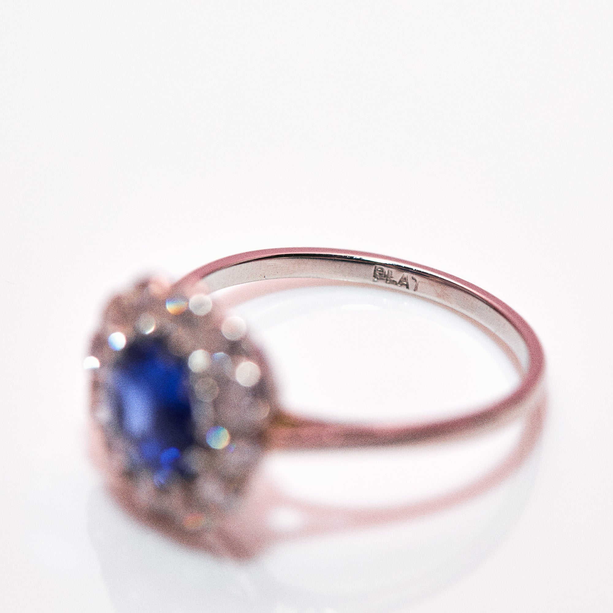Platinum ring with a sapphire and diamonds