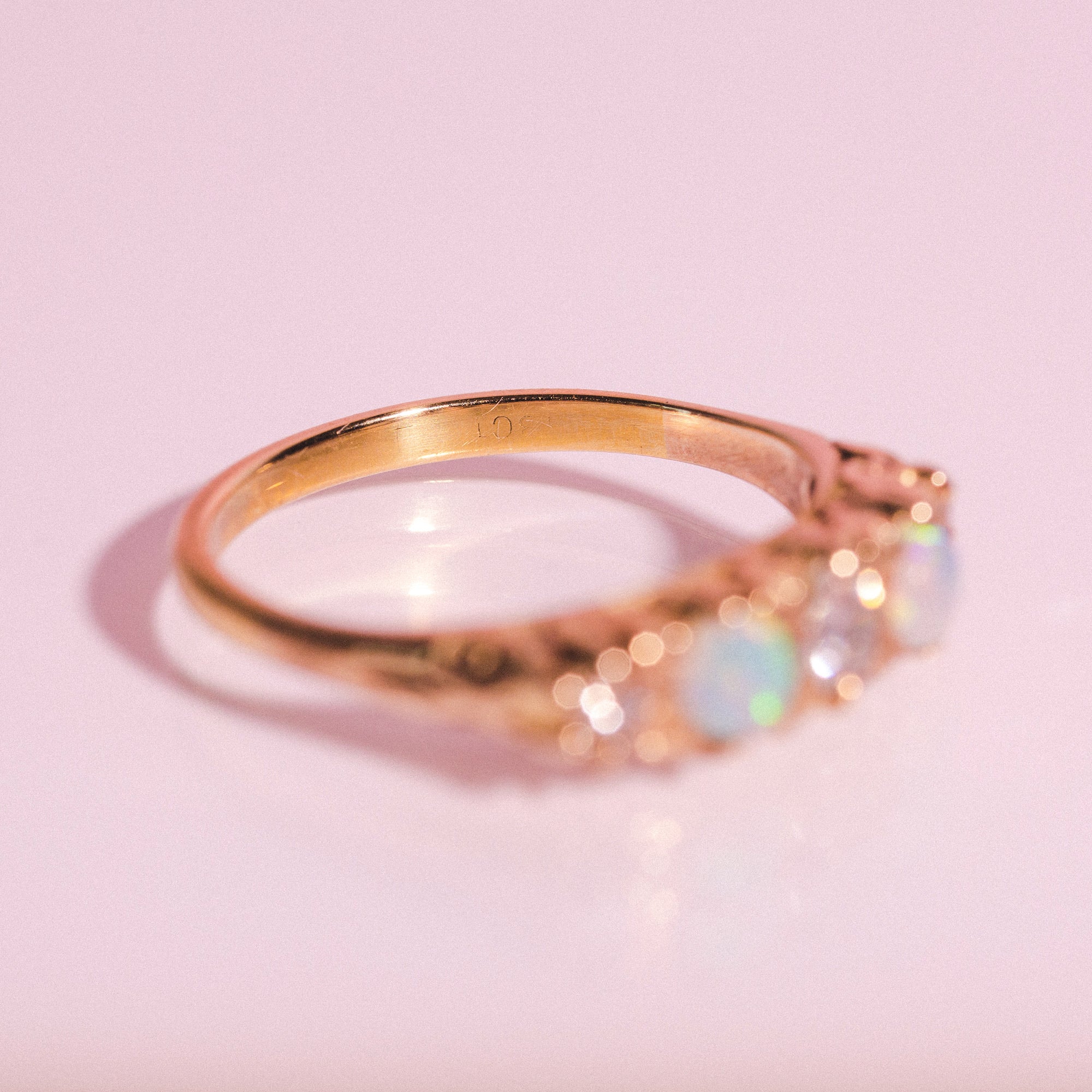 18ct gold ring set with opals and diamonds