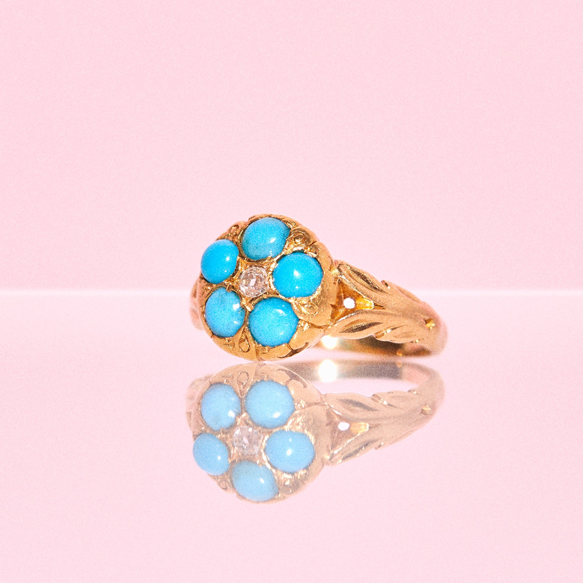 18ct gold turquoise and a diamond flower ring