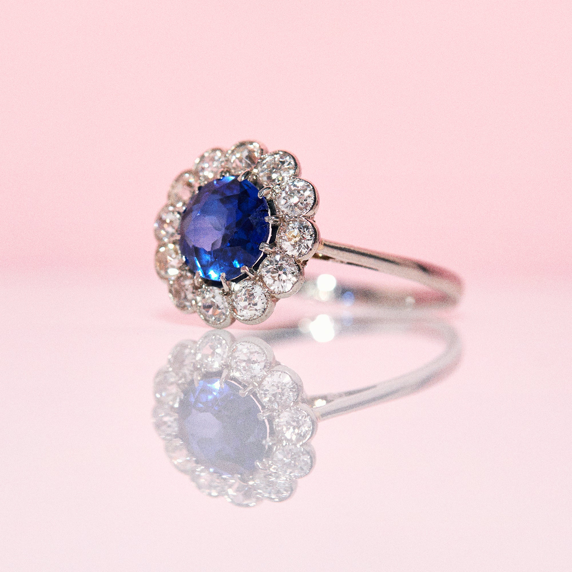 Platinum ring with a sapphire and diamonds