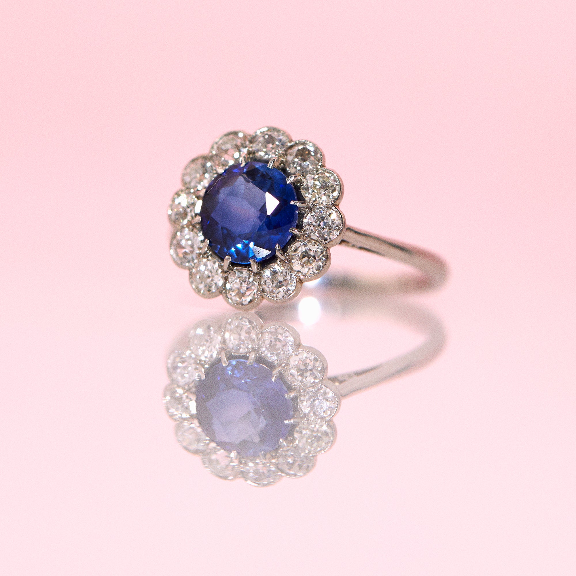 Platinum ring with a sapphire and diamonds