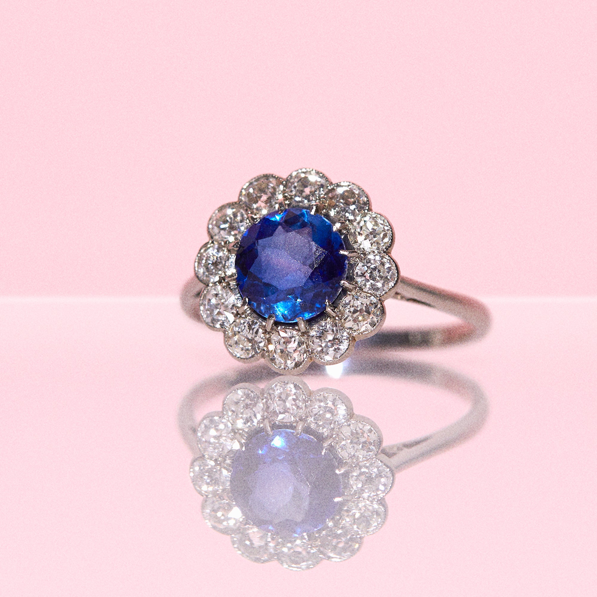 Platinum ring with a sapphire and diamonds