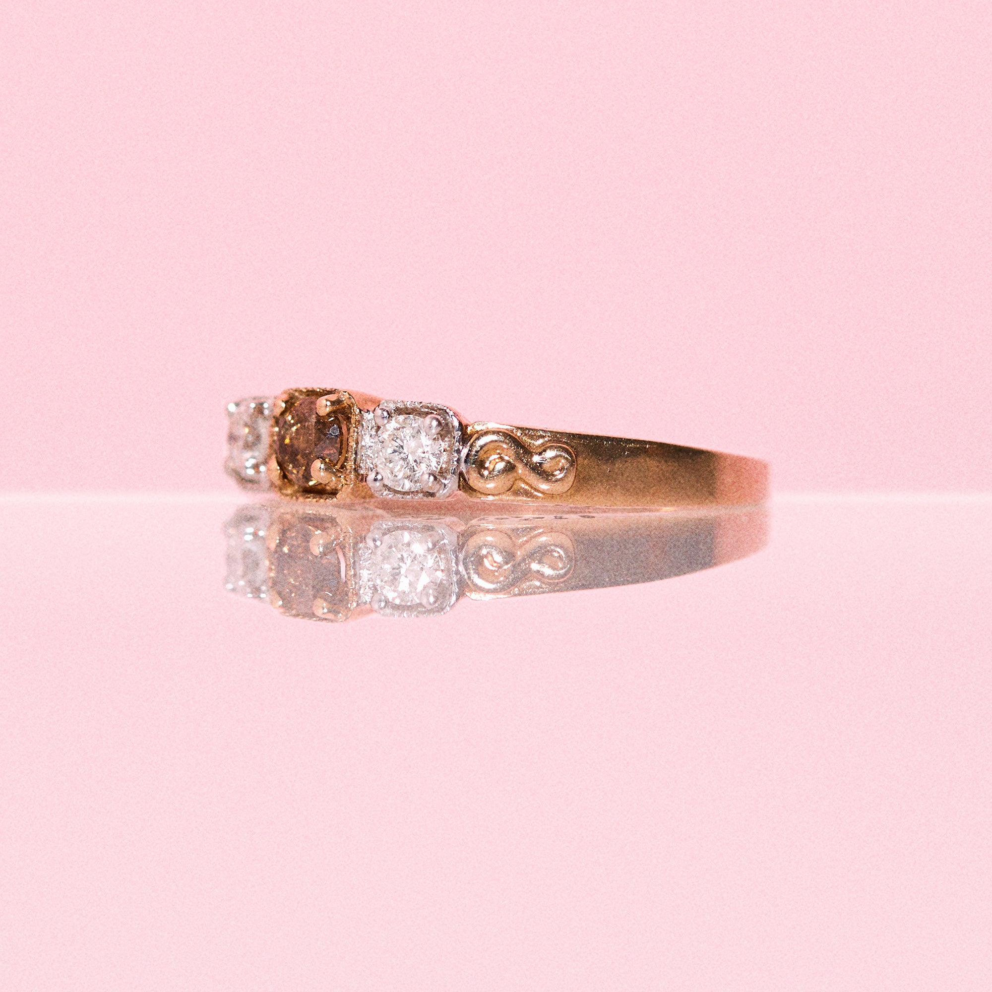 9ct gold ring set with three diamonds