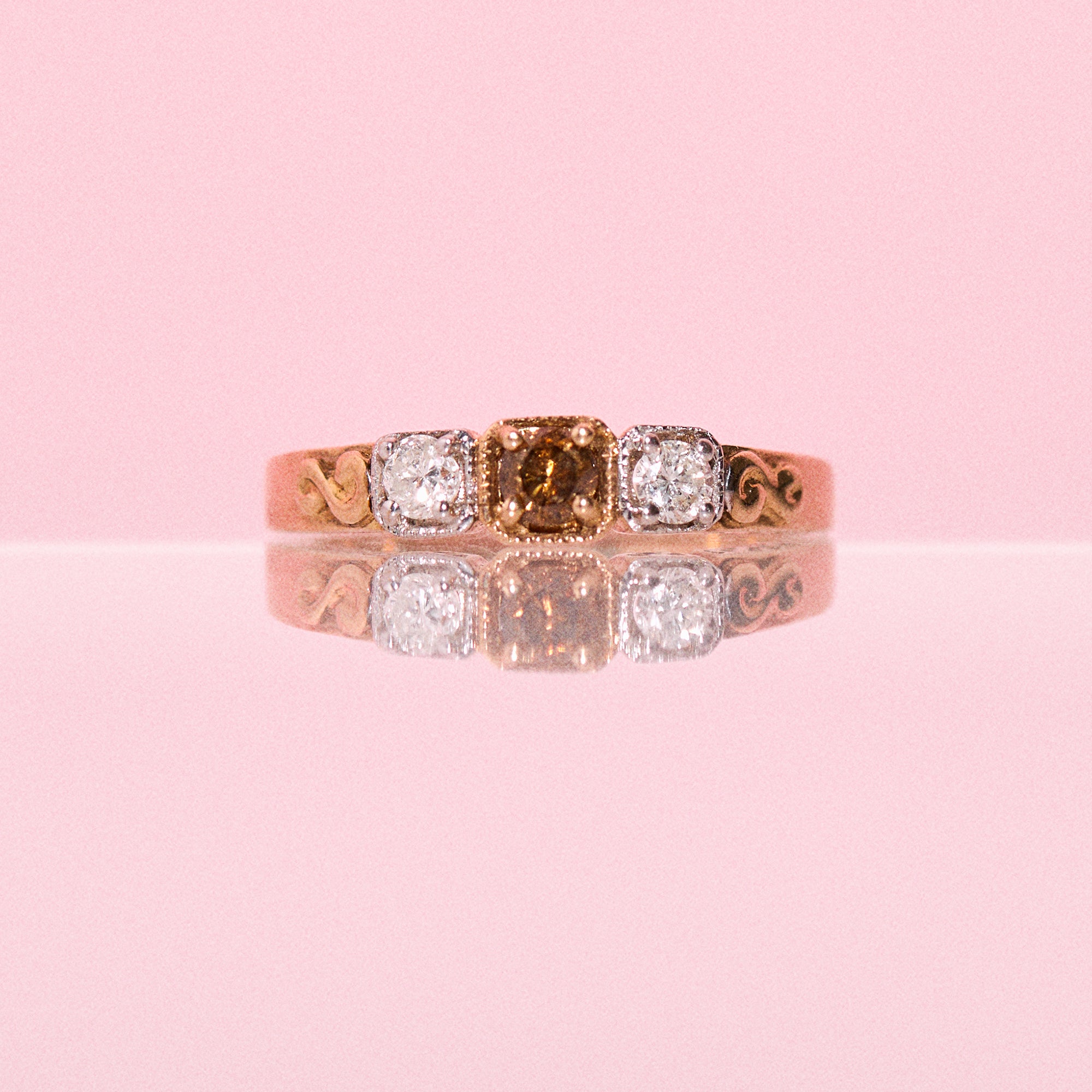 9ct gold ring set with three diamonds