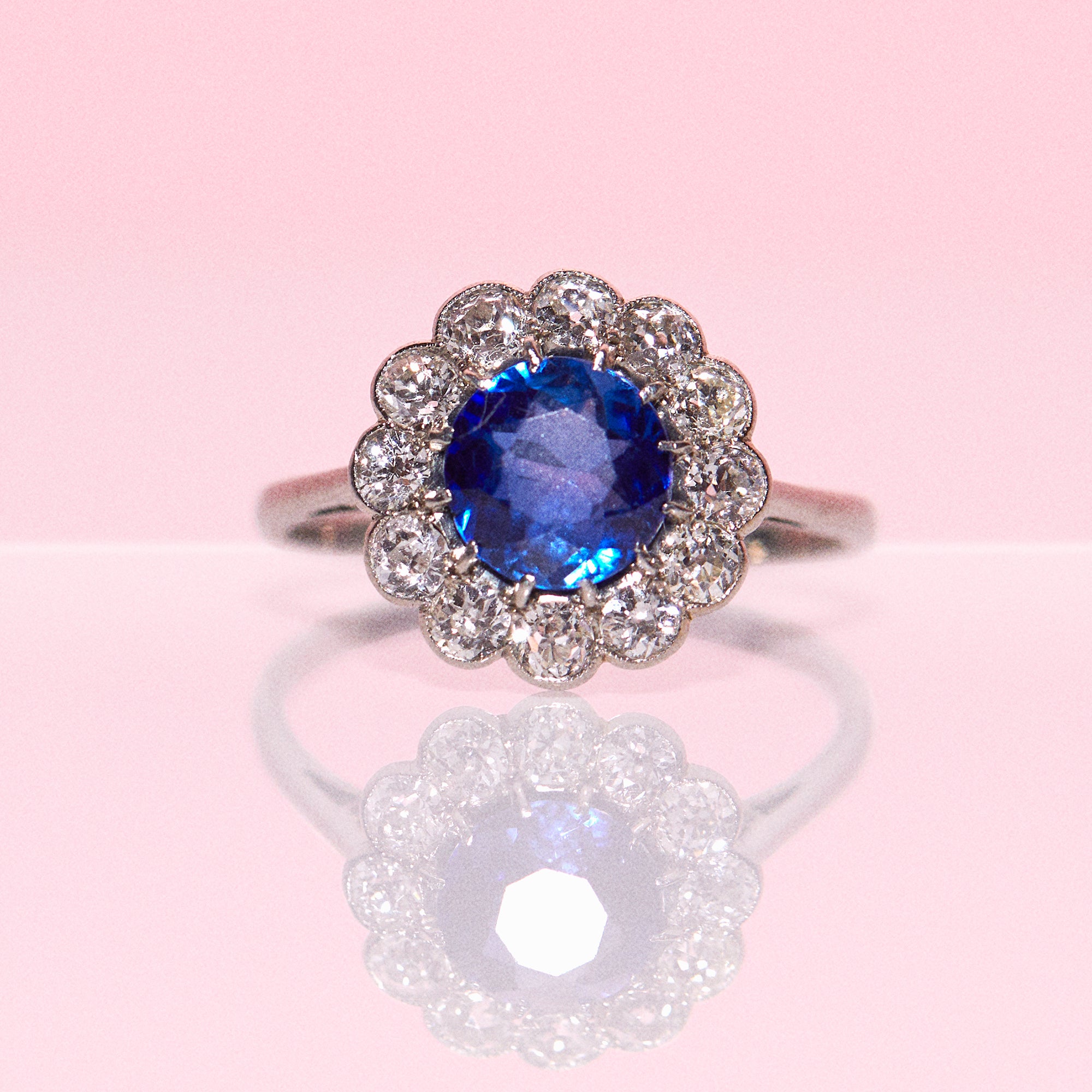 Platinum ring with a sapphire and diamonds