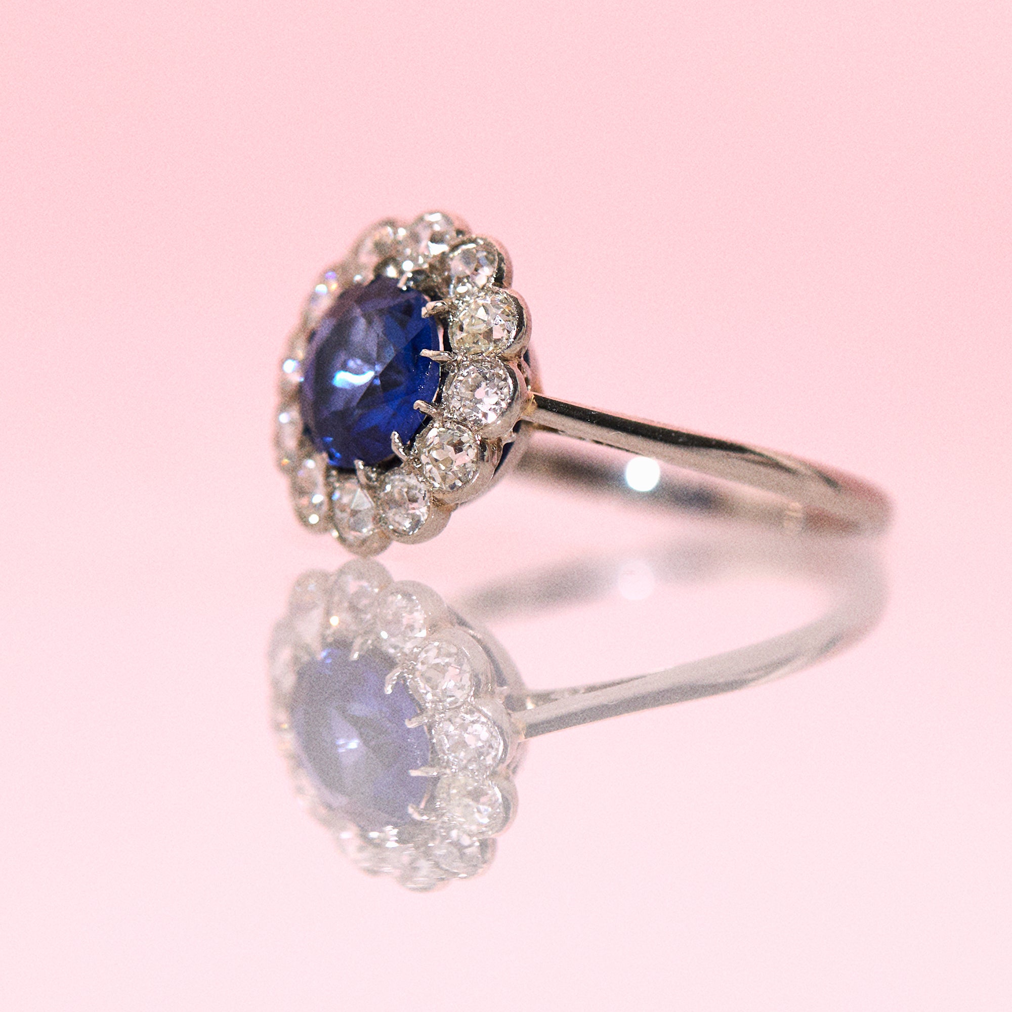 Platinum ring with a sapphire and diamonds